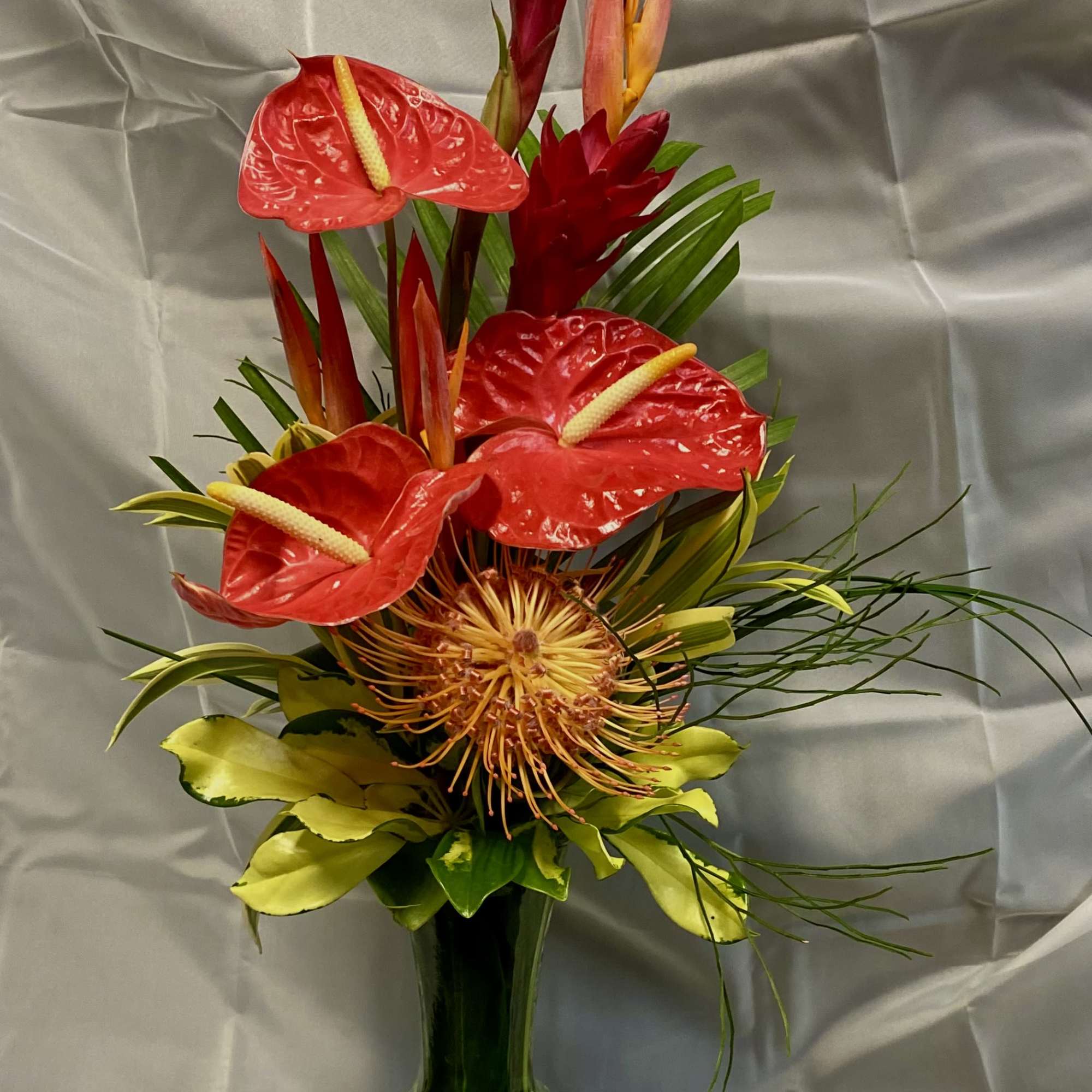 RED or PINK GINGER, CITZ, ANTHURIUM, PROTEA &amp; GREENS

Flowers are based on