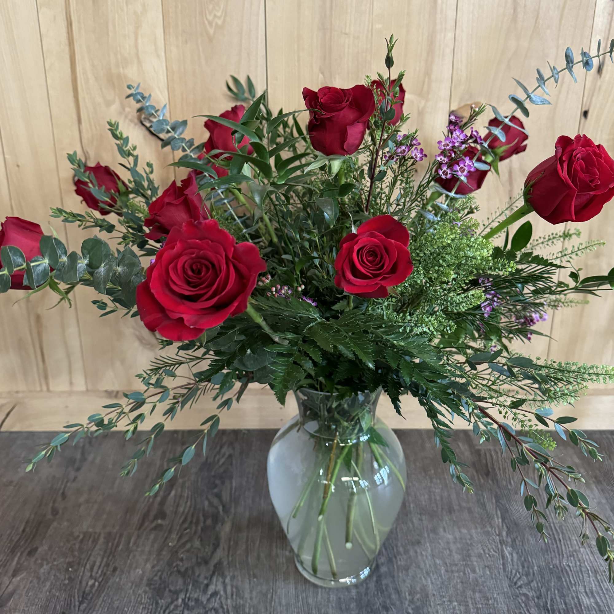 Enjoy a large and full vase arrangement with gorgeous, fillers greens and