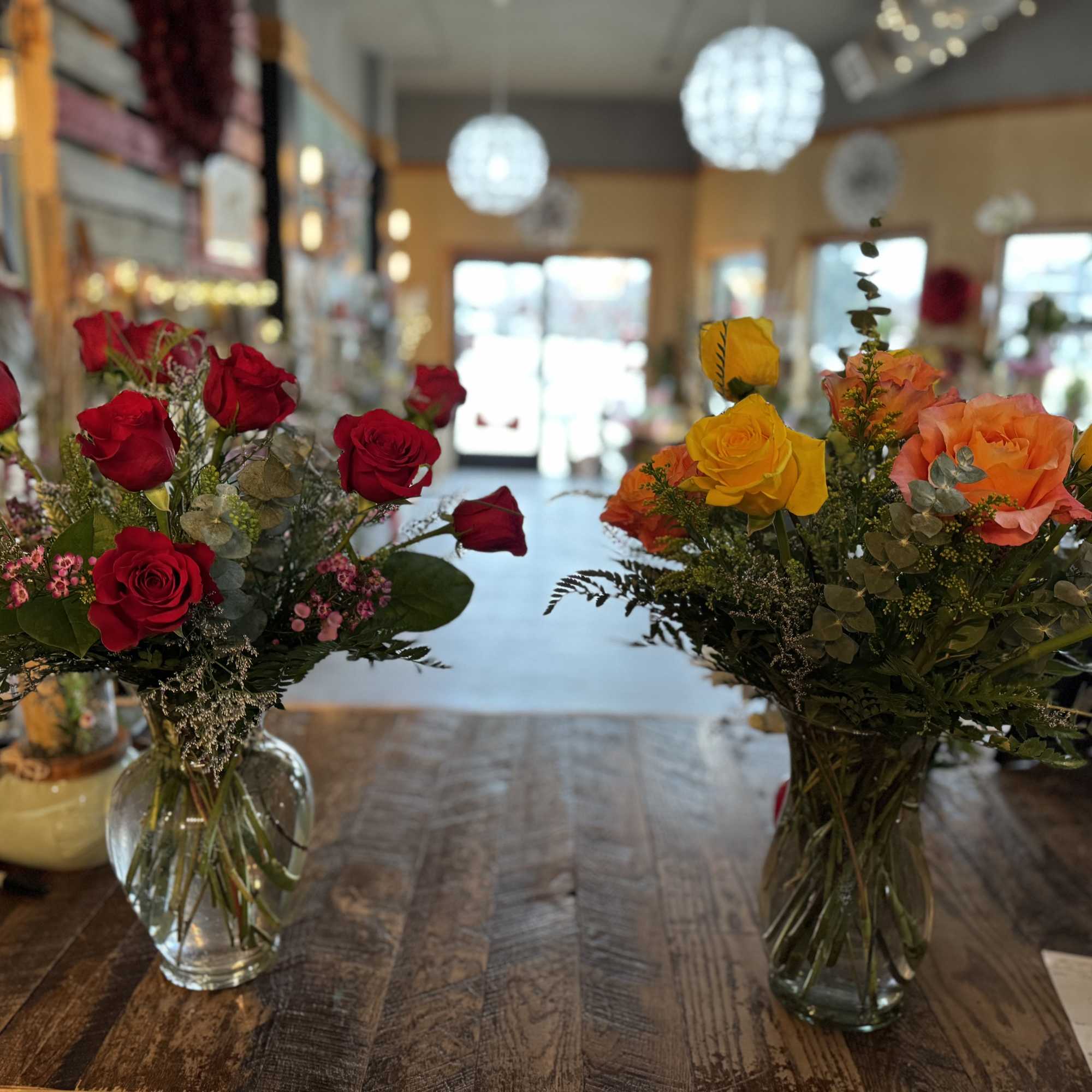 Enjoy a large and full vase arrangement with gorgeous, fillers greens and