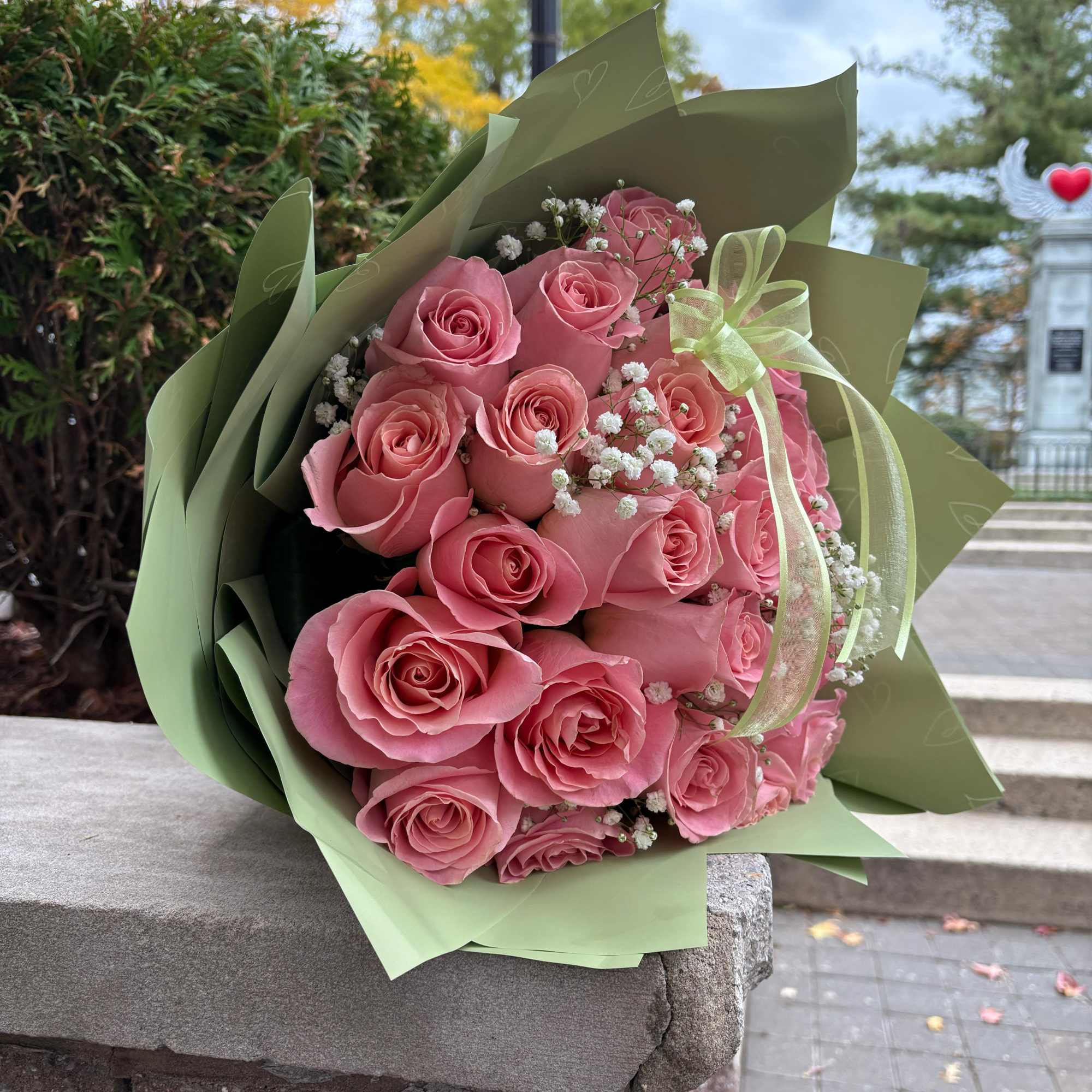 Express elegance and affection with this stunning bouquet of 24 light pink