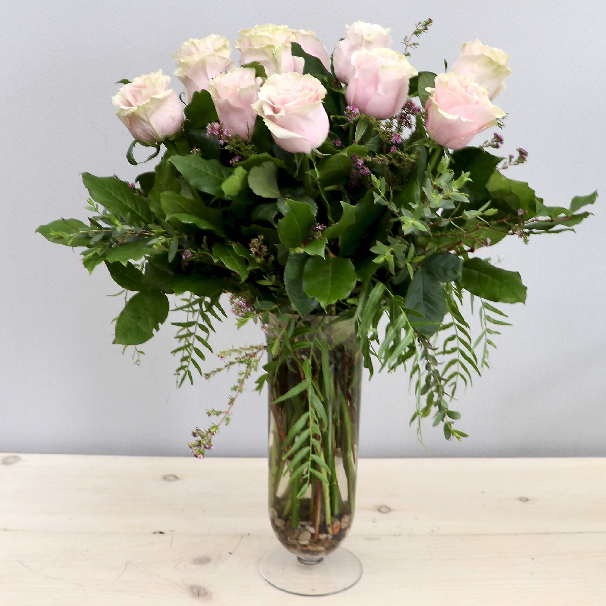 One Dozen red, tall, premium, Ecuadorian roses designed beautifully for that special