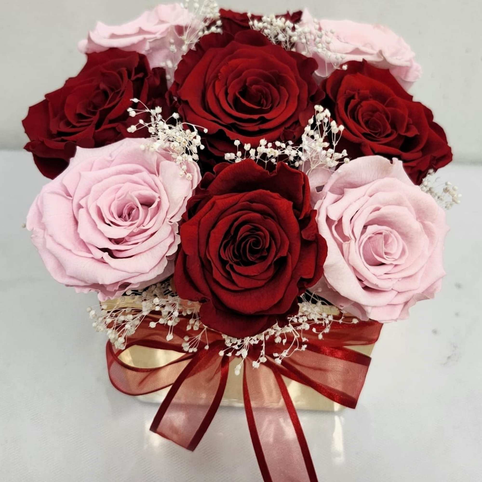 9 Beautiful "Preserved" Roses in shades of pink and red, with a