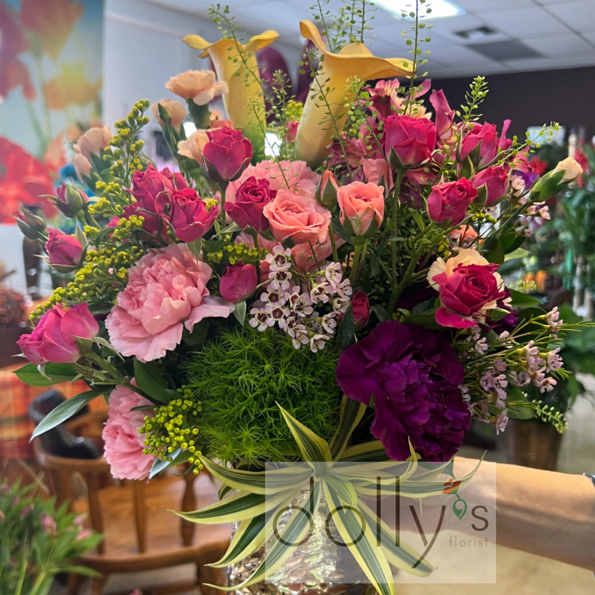 Get the festivities going with this invitation of calla lilies, and roses.