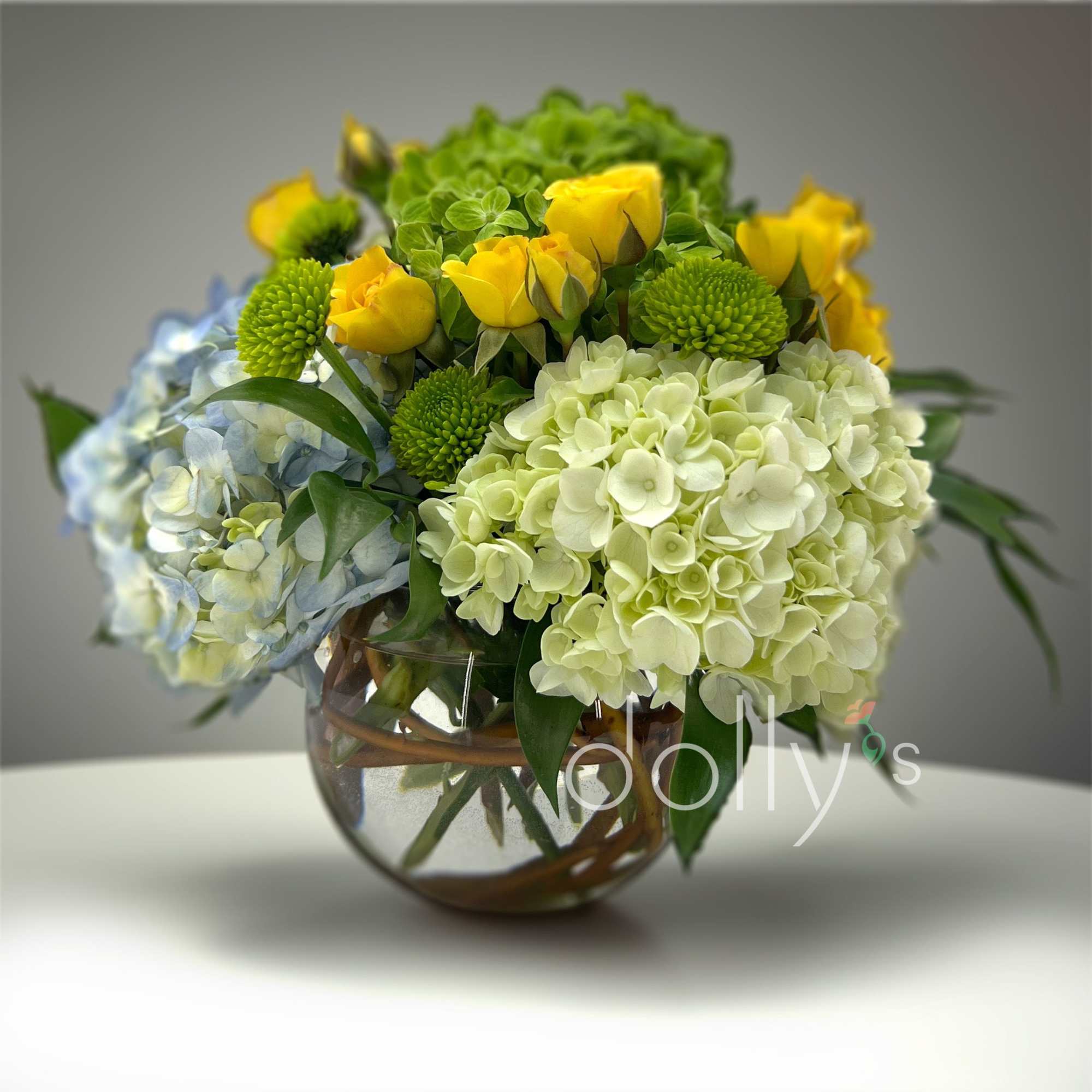 Add a touch of elegance with a floral arrangement featuring blue and