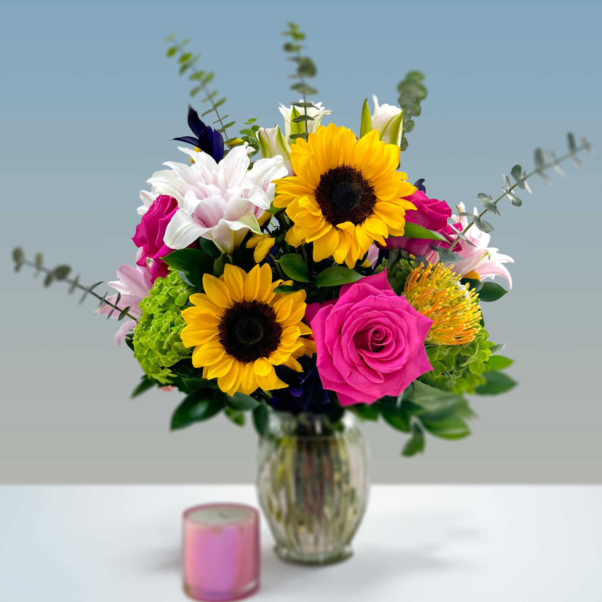 Regality and innocence come to mind with this bouquet of hydrangeas, pink