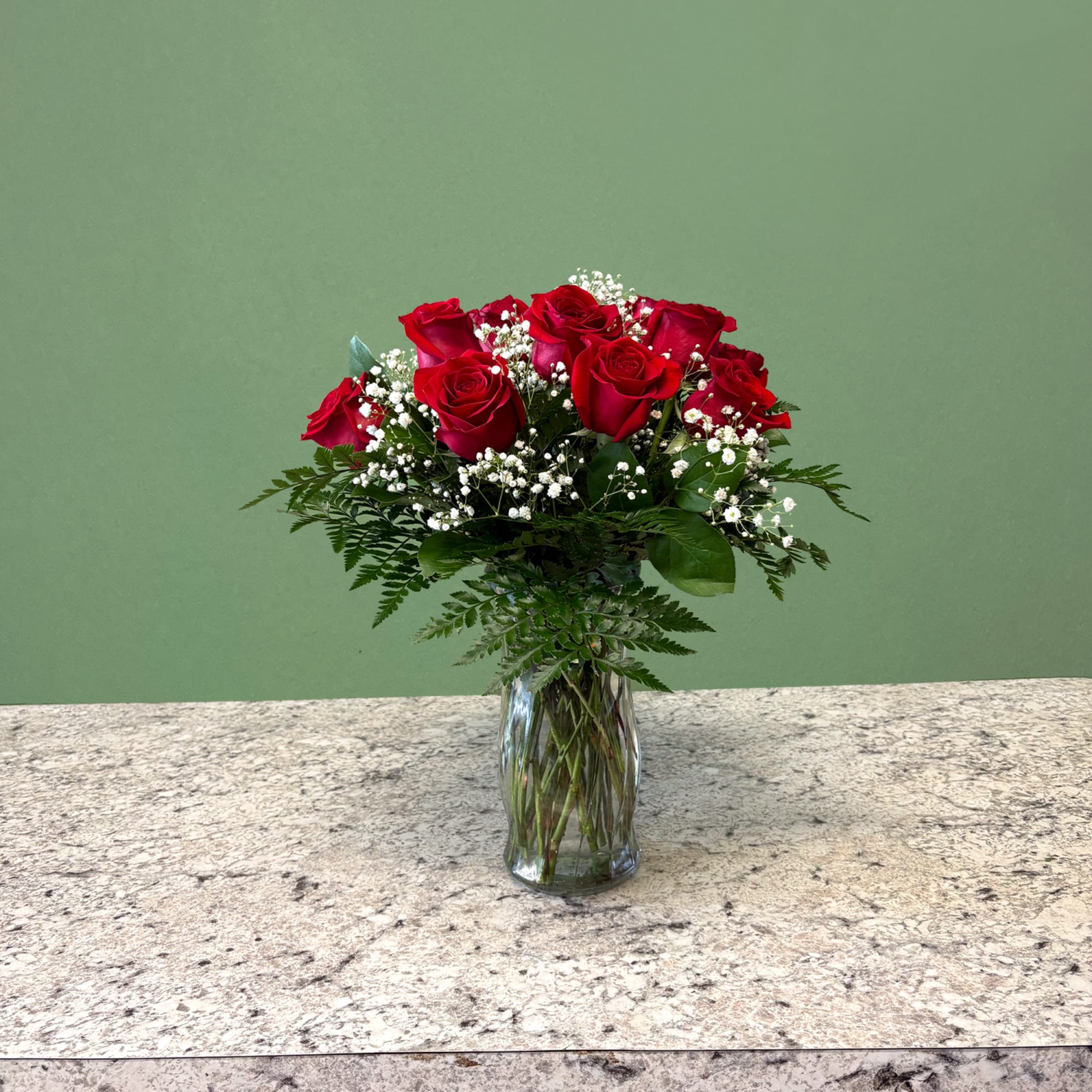 A timeless expression of love and admiration. Featuring premium red roses, complemented