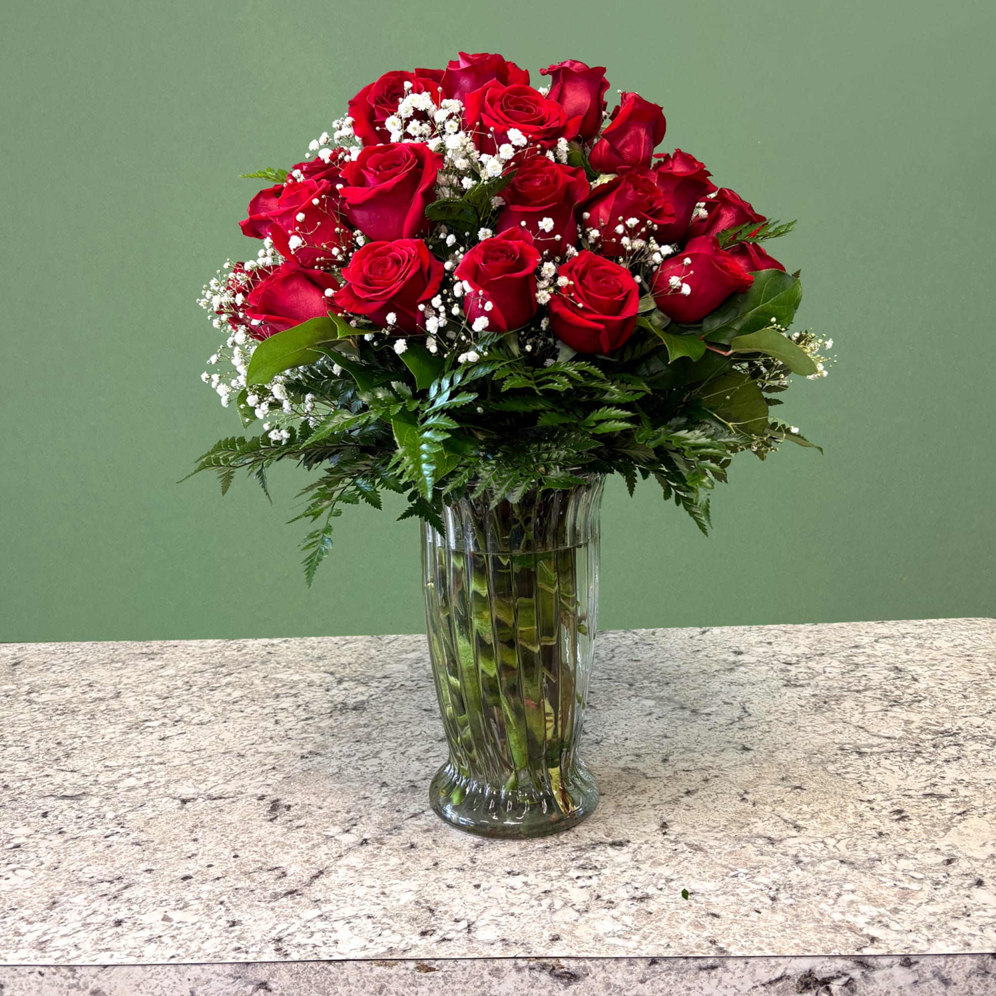 A timeless expression of love and admiration. Featuring premium red roses, complemented