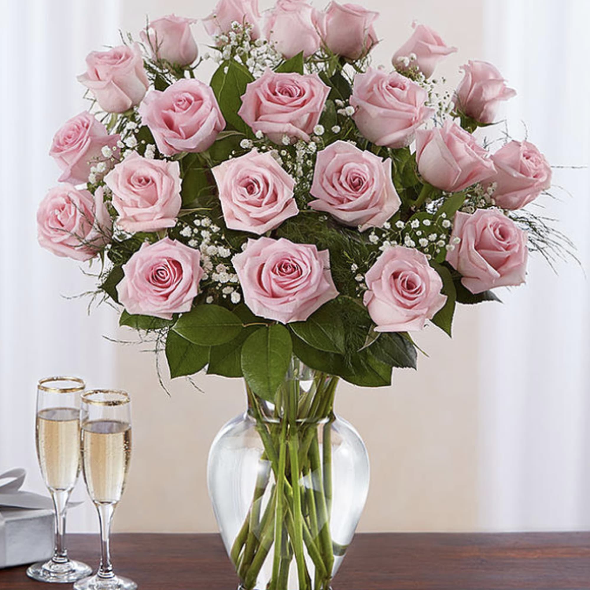 These pink roses are cheerful and fun! Dozen Long Stemmed Pink Roses
