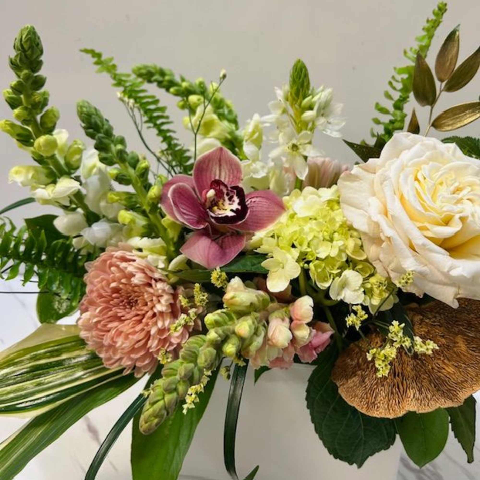 Delicate and refined, Soft &amp; Blush is an upscale floral arrangement that