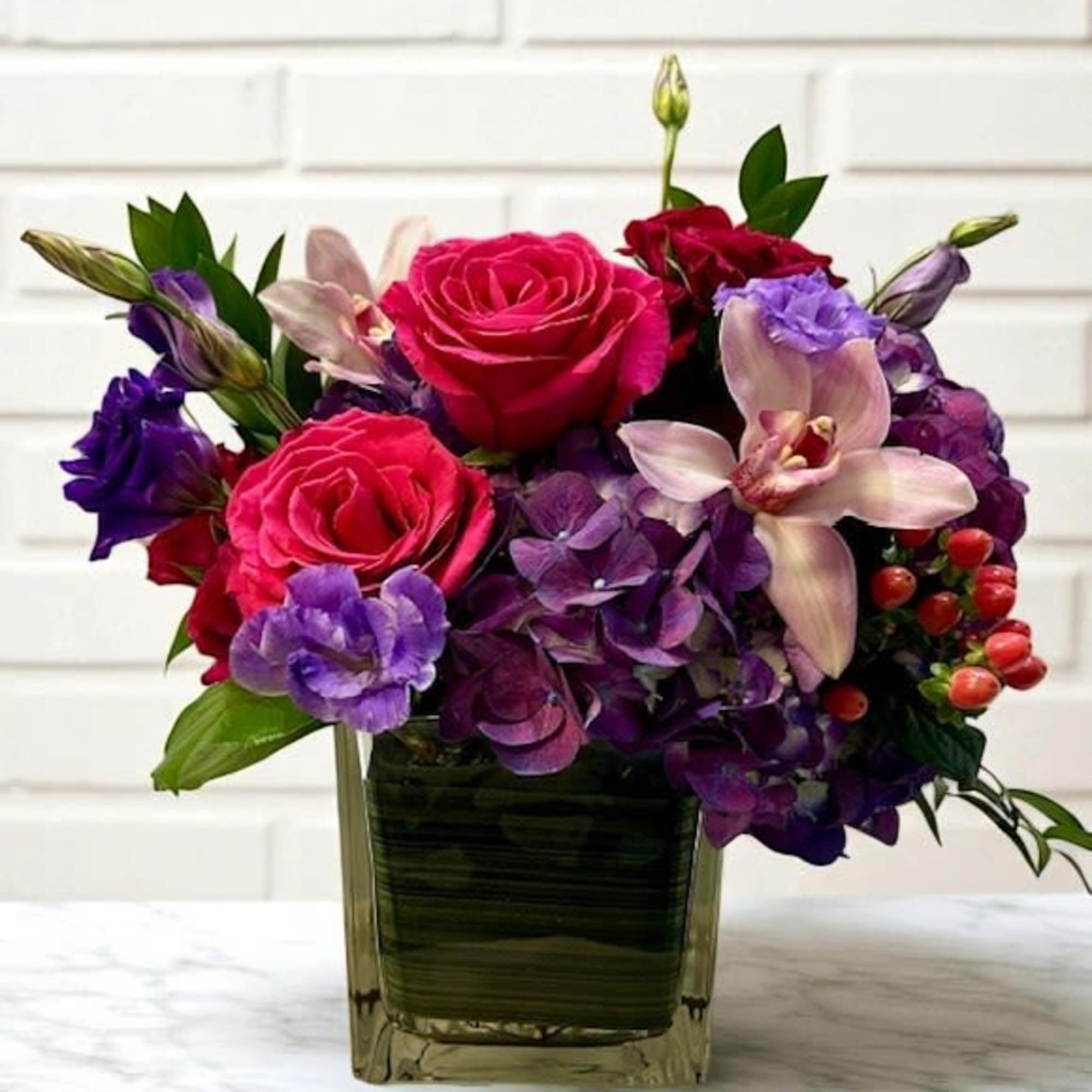 A fresh and vibrant mix of purple and pink tones, artfully arranged