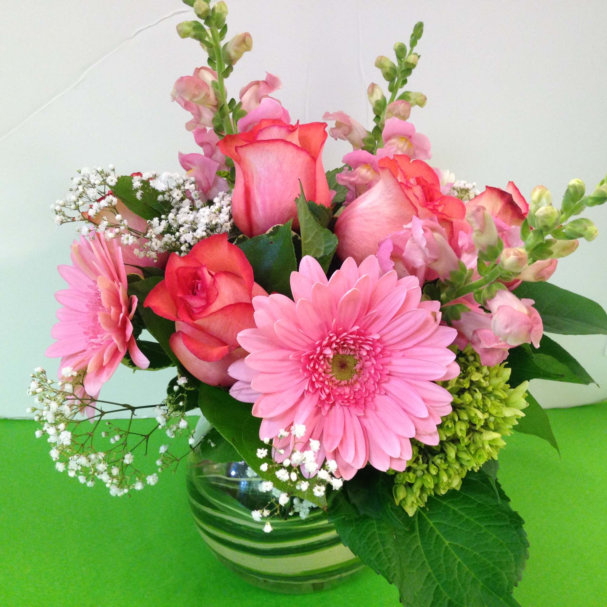  Gerbera Daisies, Roses, Assorted Seasonal Flowers, Fancy Greens