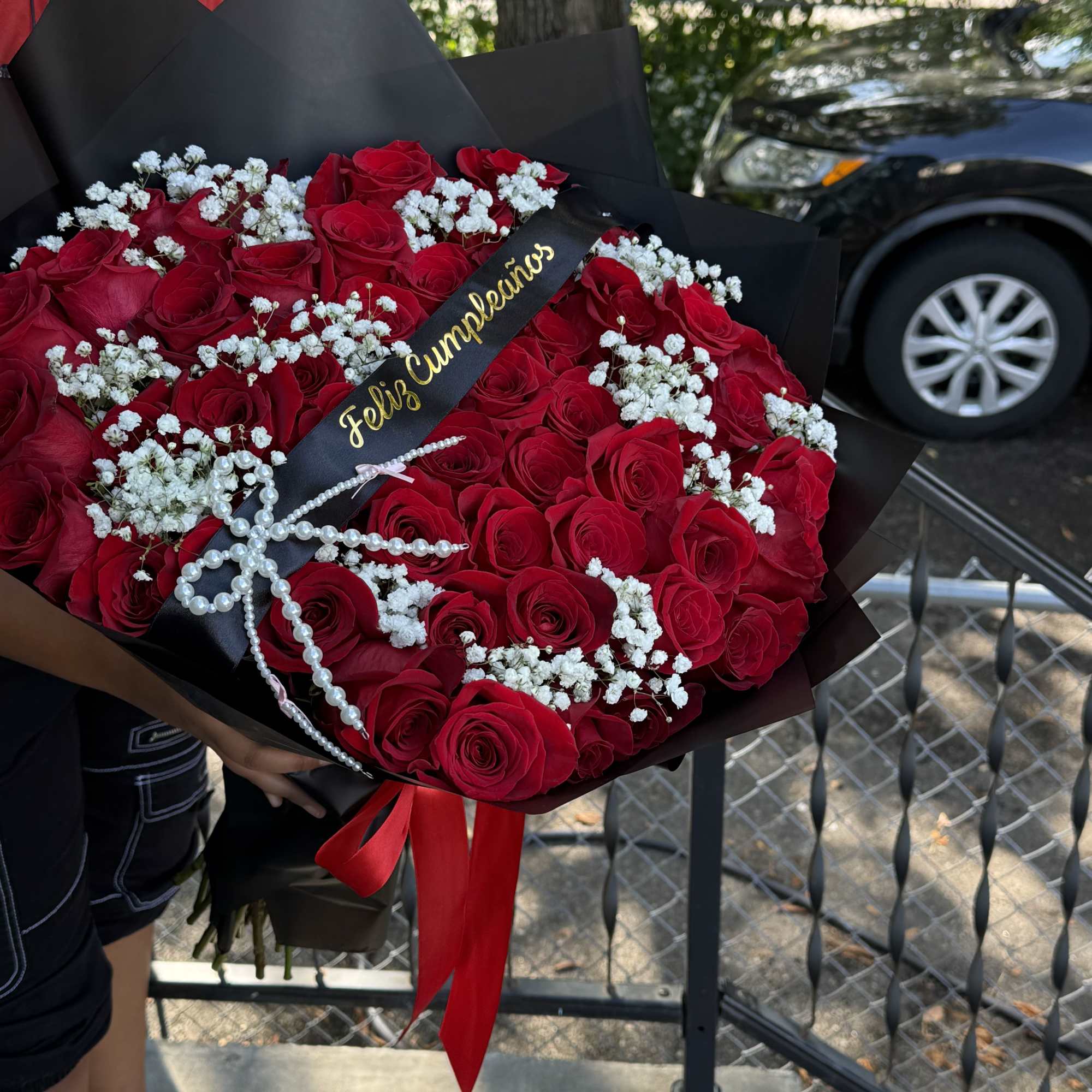 Amazing big bouquet of 50 red roses  with a touch of