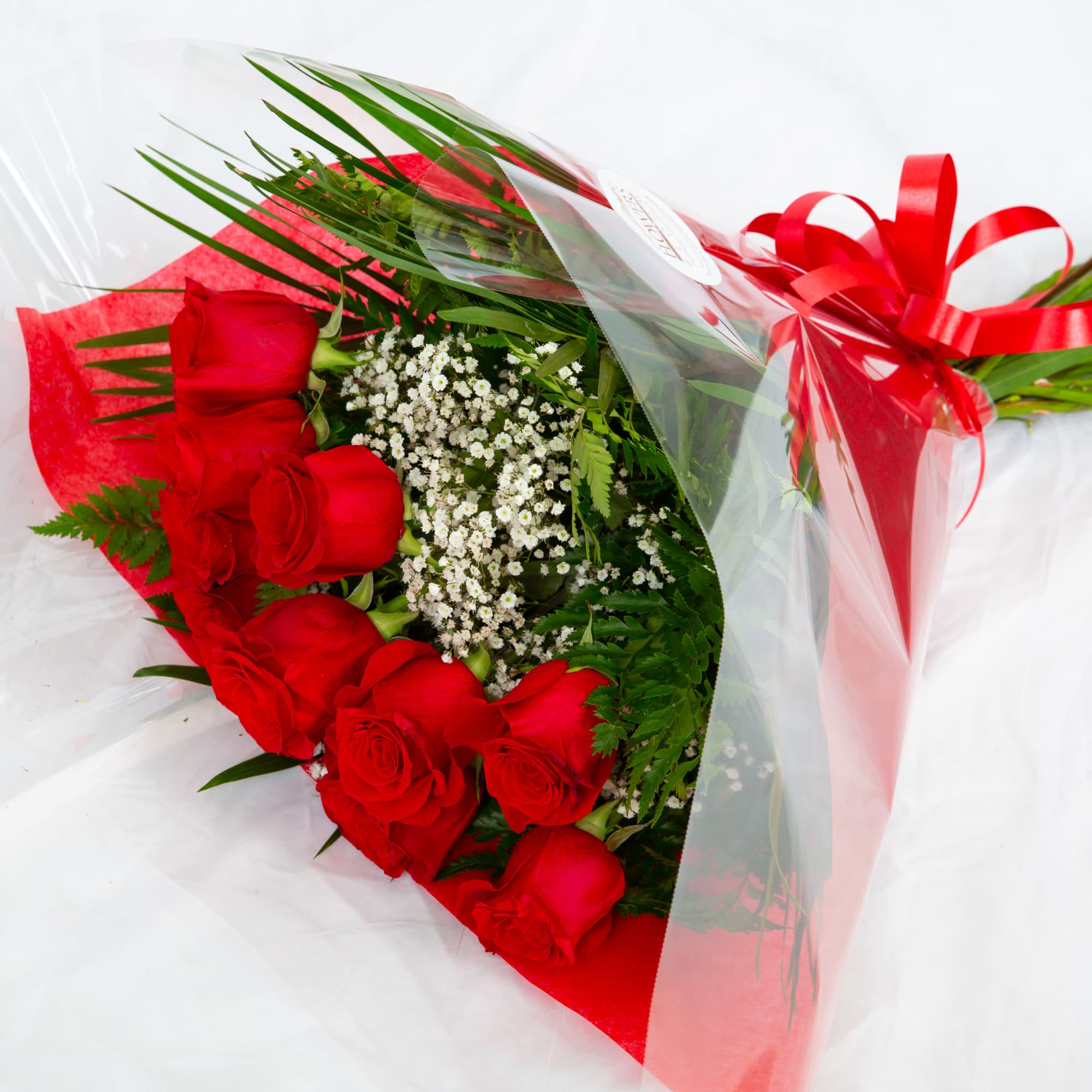 Wrapped one dozen roses in a bouquet. Let us know if you