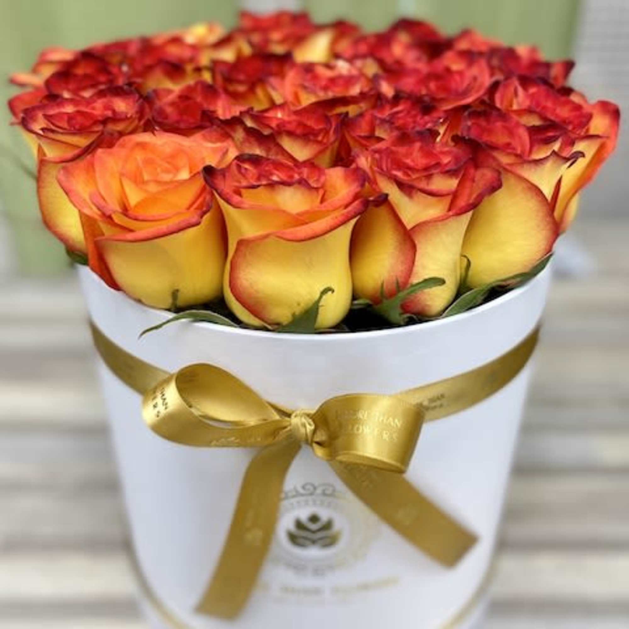 Round Box Roses Bouquet: Think different! Hand picked roses artistically placed in
