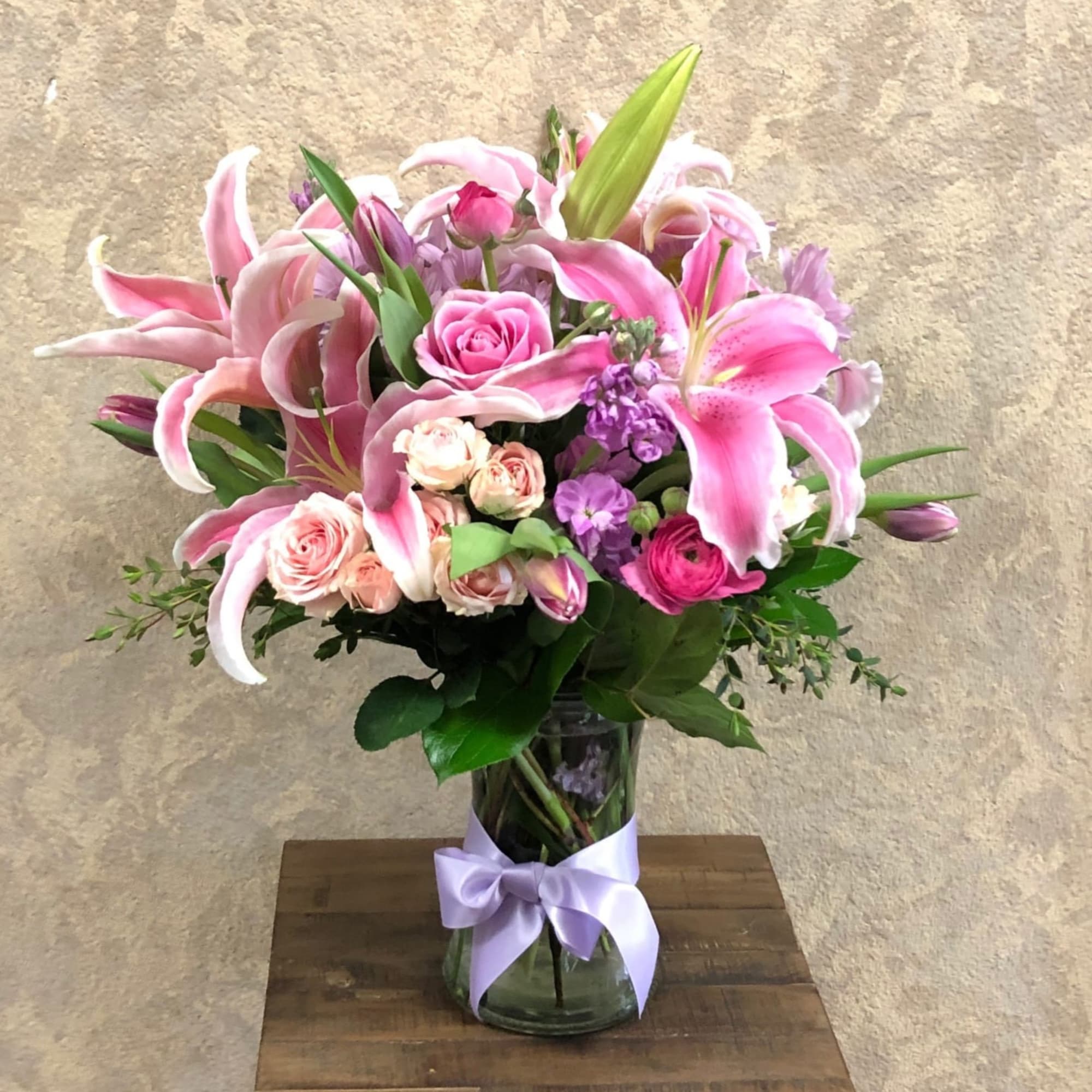 Recipe: Stargazer Lilies, Roses, Spray Roses, Ranuculus (seasonal), Pink Tulips, Stock and