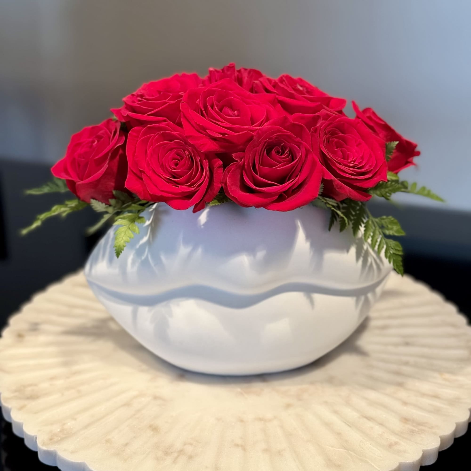 A floral arrangement designed to capture hearts. This piece features a lush