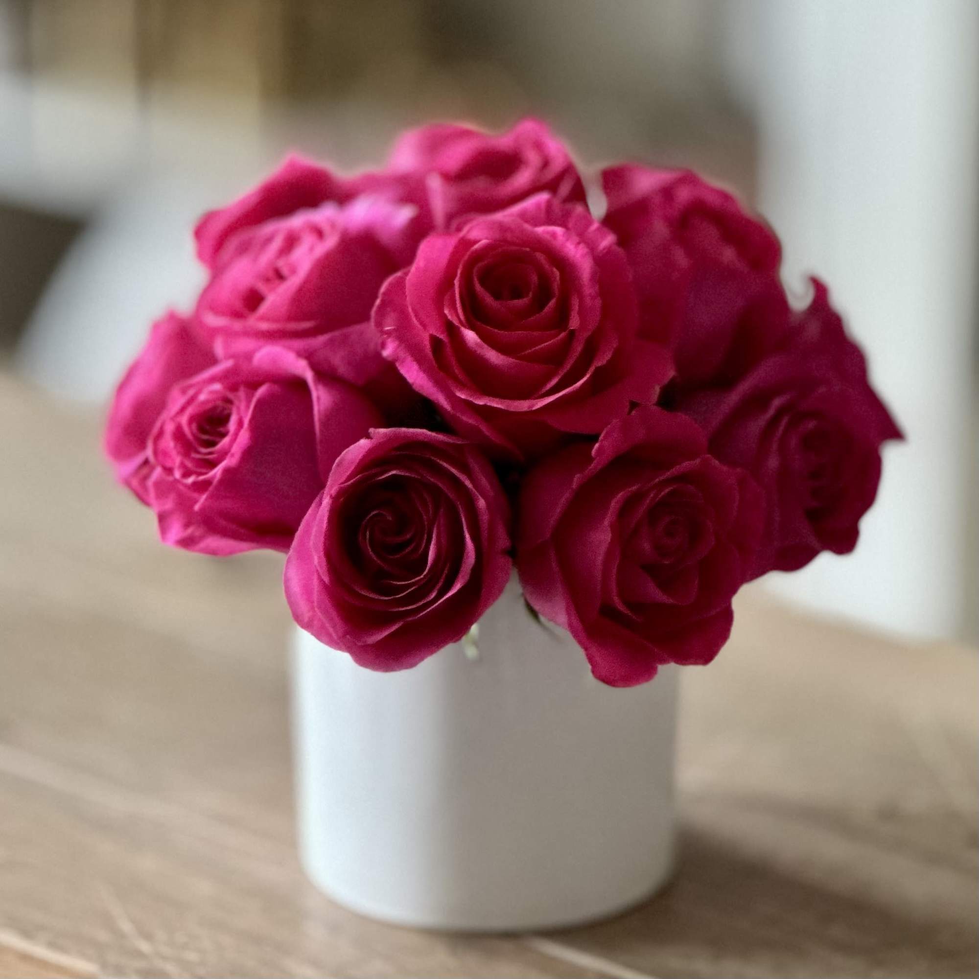 Sometimes flowers don&rsquo;t need a reason.
This joyful arrangement of vibrant hot-pink roses