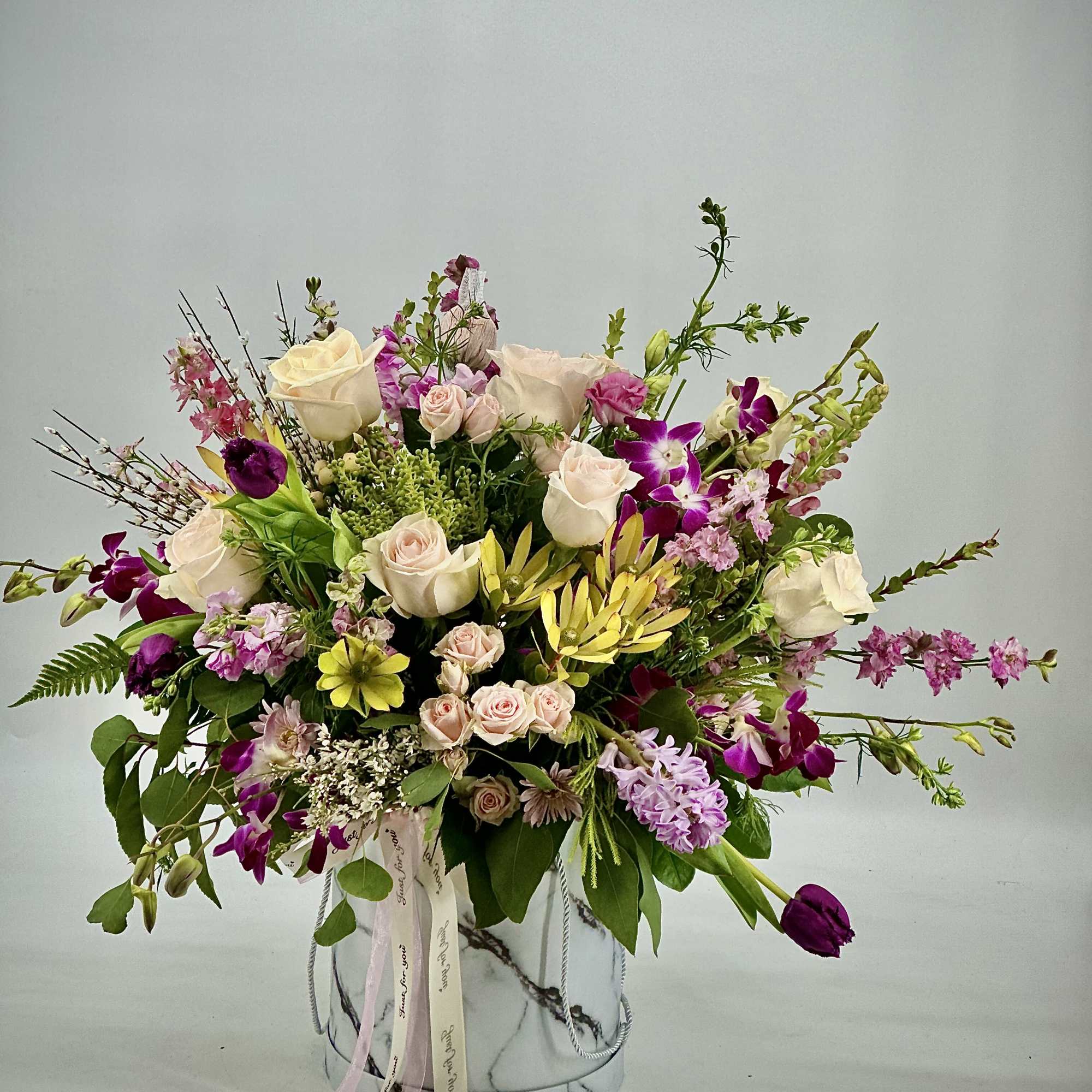 An exquisite ,one - of -a -kind floral arrangement designed for those