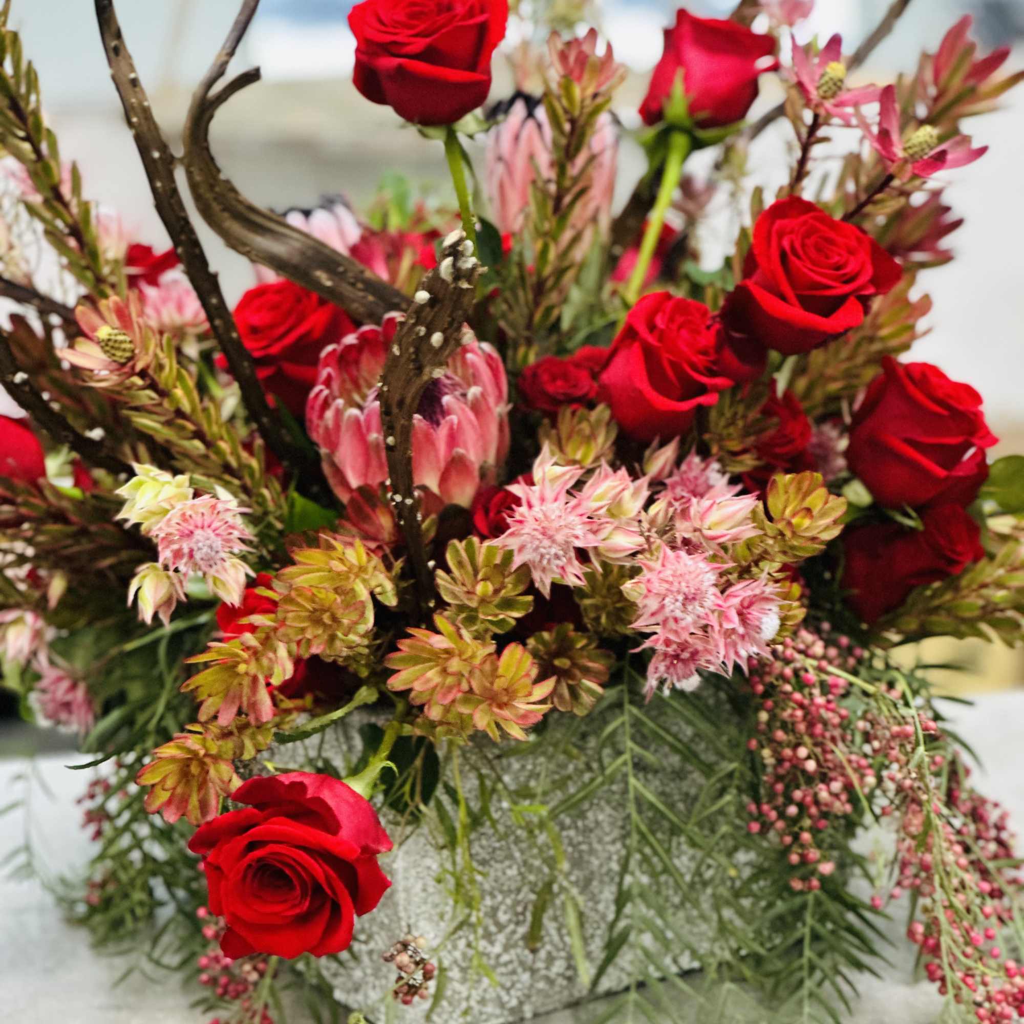 An exquisite ,one - of -a -kind floral arrangement designed for those
