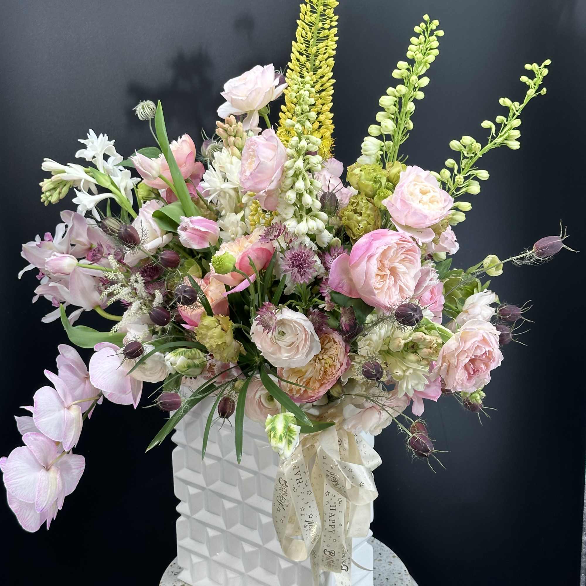 An exquisite ,one - of -a -kind floral arrangement designed for those