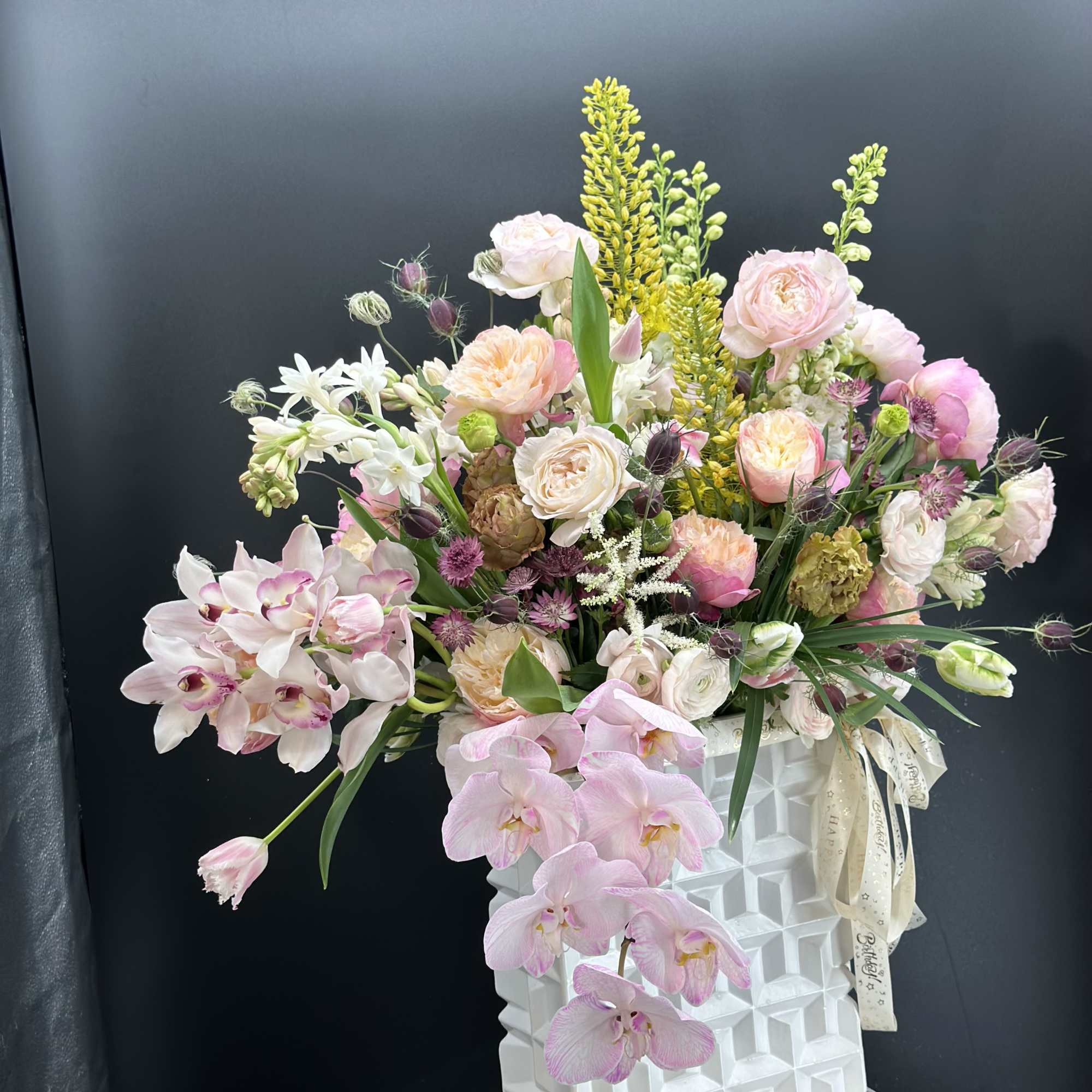 An exquisite ,one - of -a -kind floral arrangement designed for those