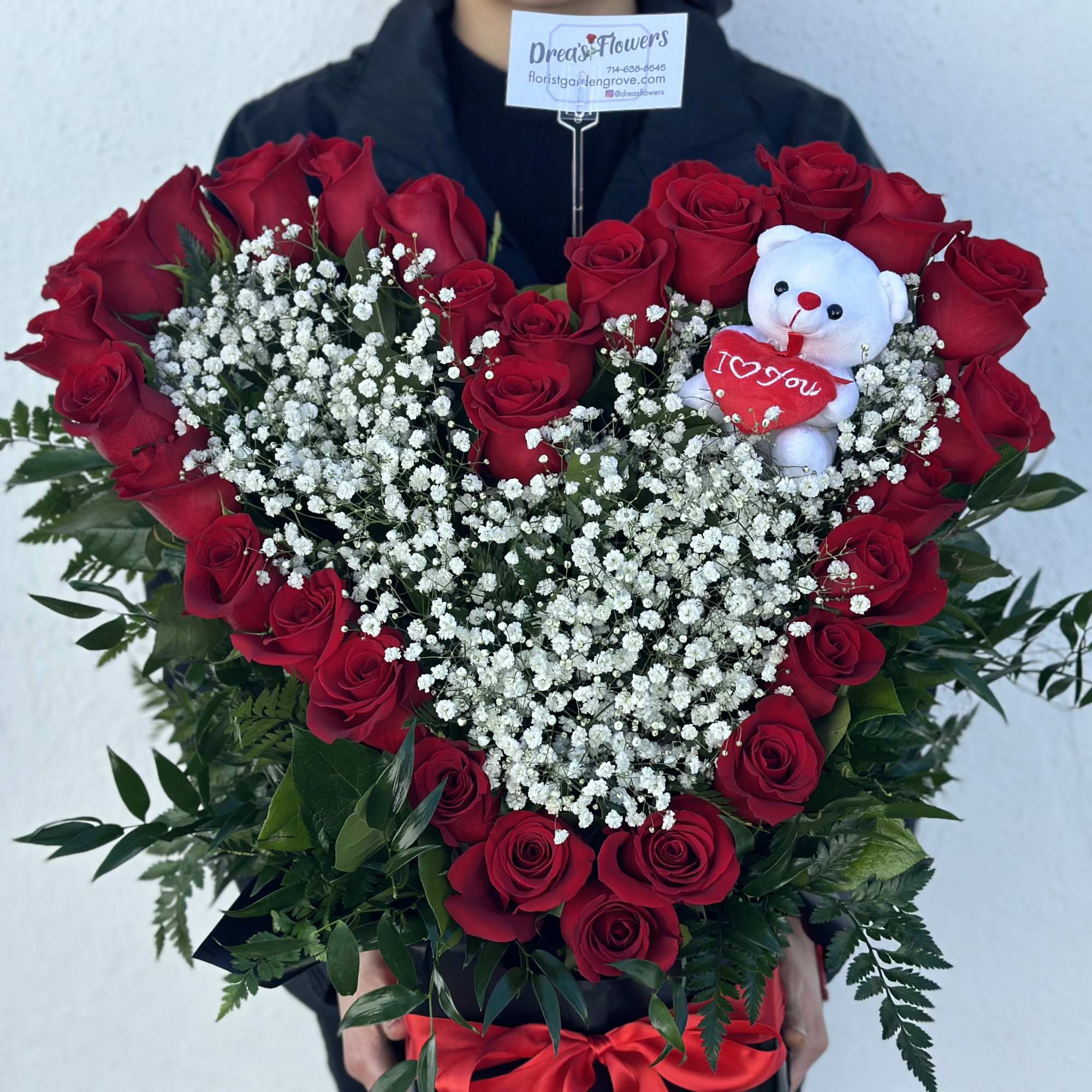 Give them your heart with roses shaped into a heart. 