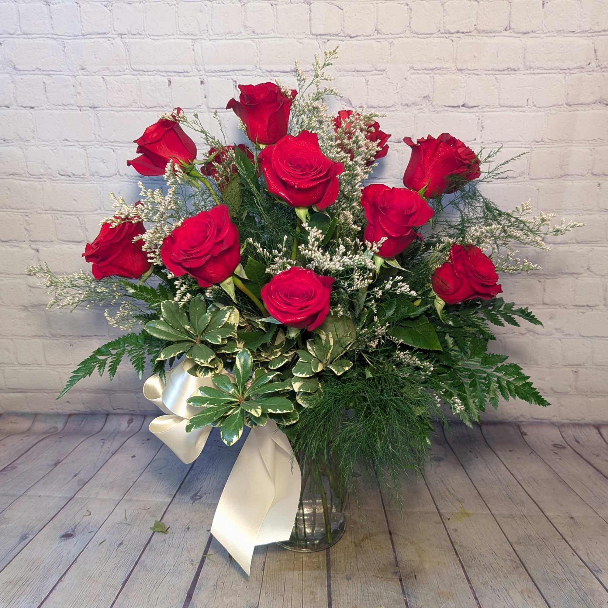 Nothing compares to the timeless beauty of a dozen long-stemmed red roses.