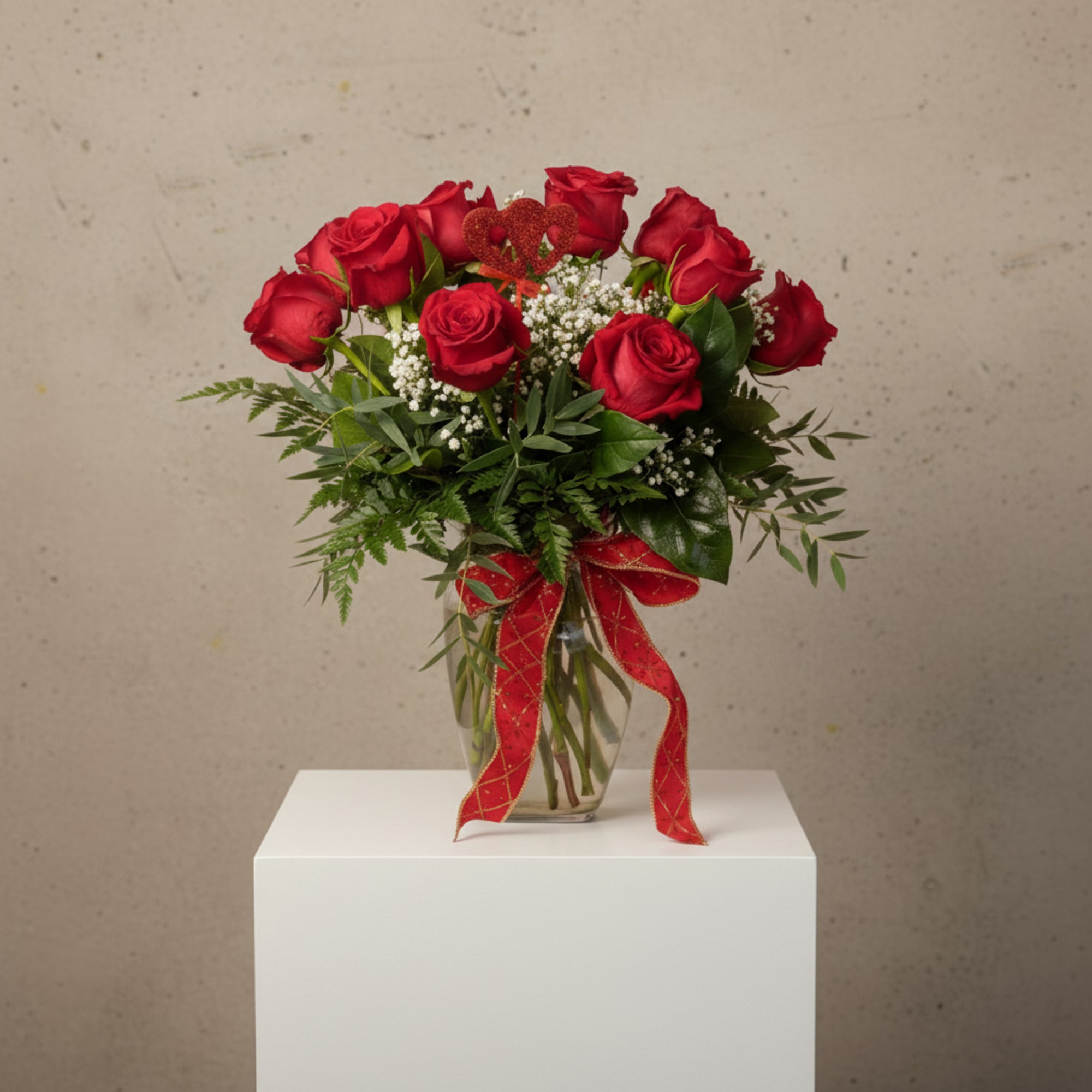 Nothing compares to the timeless beauty of a dozen long-stemmed red roses.