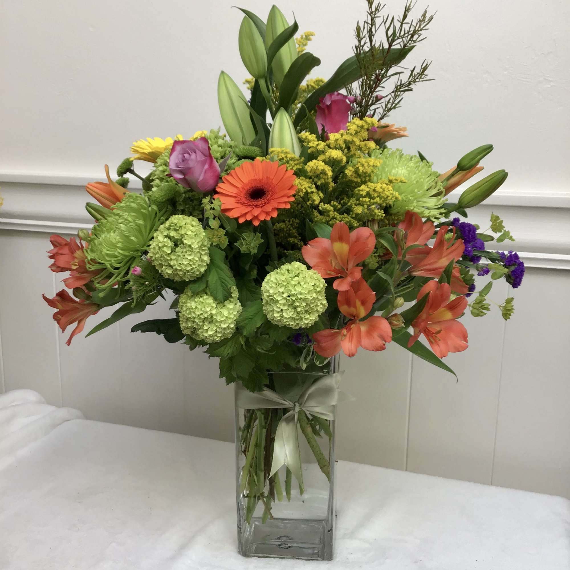 We will use colorful seasonal flowers to create an exceptional arrangement. 
*flowers