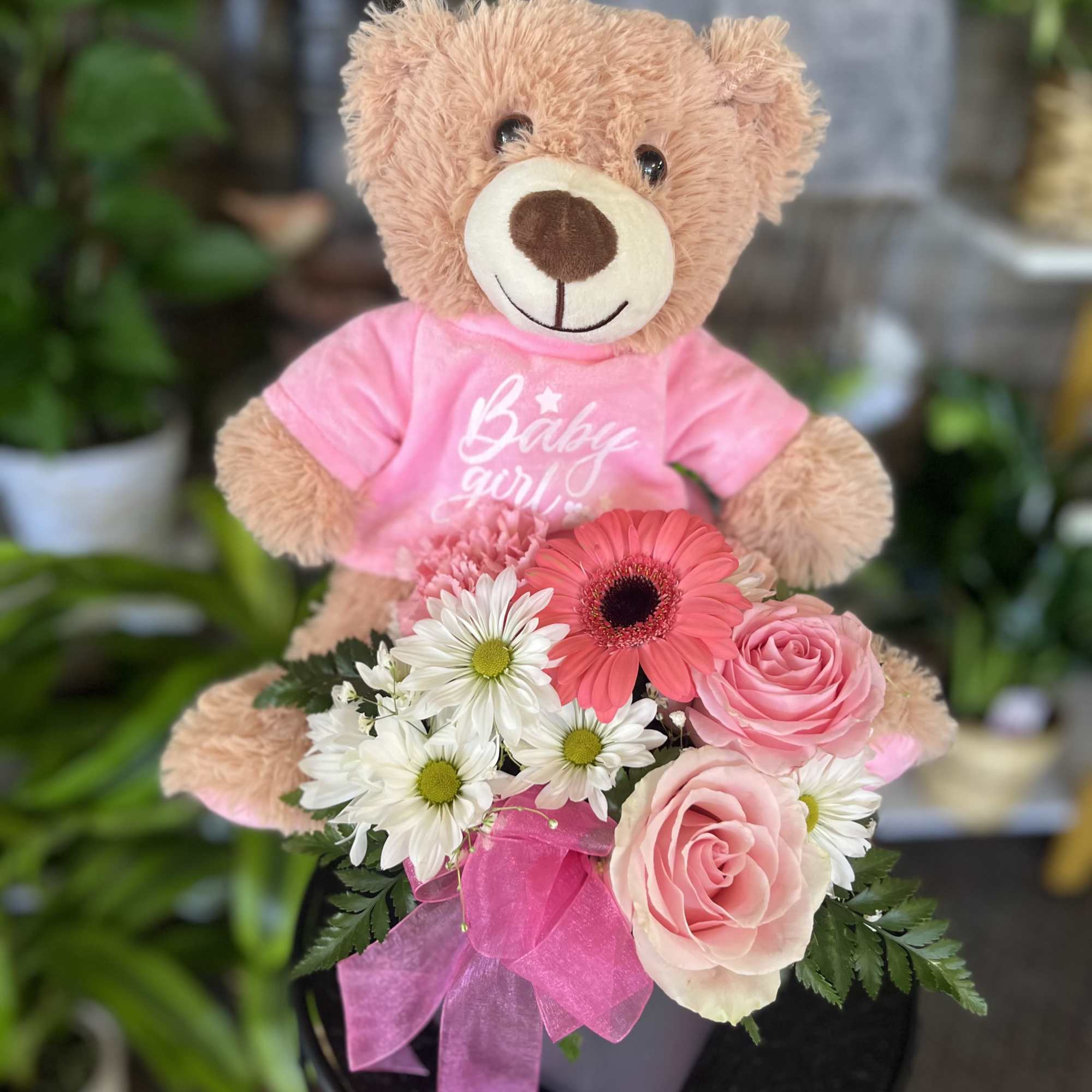 fresh flowers in cube with bear 

The color of Gerber flowers may