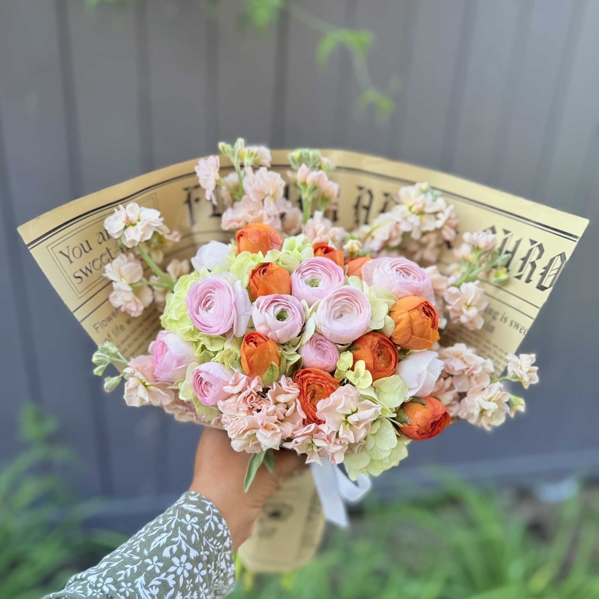 Gorgeous bouquet designed with 18 precious premium ranunculus in light pink and