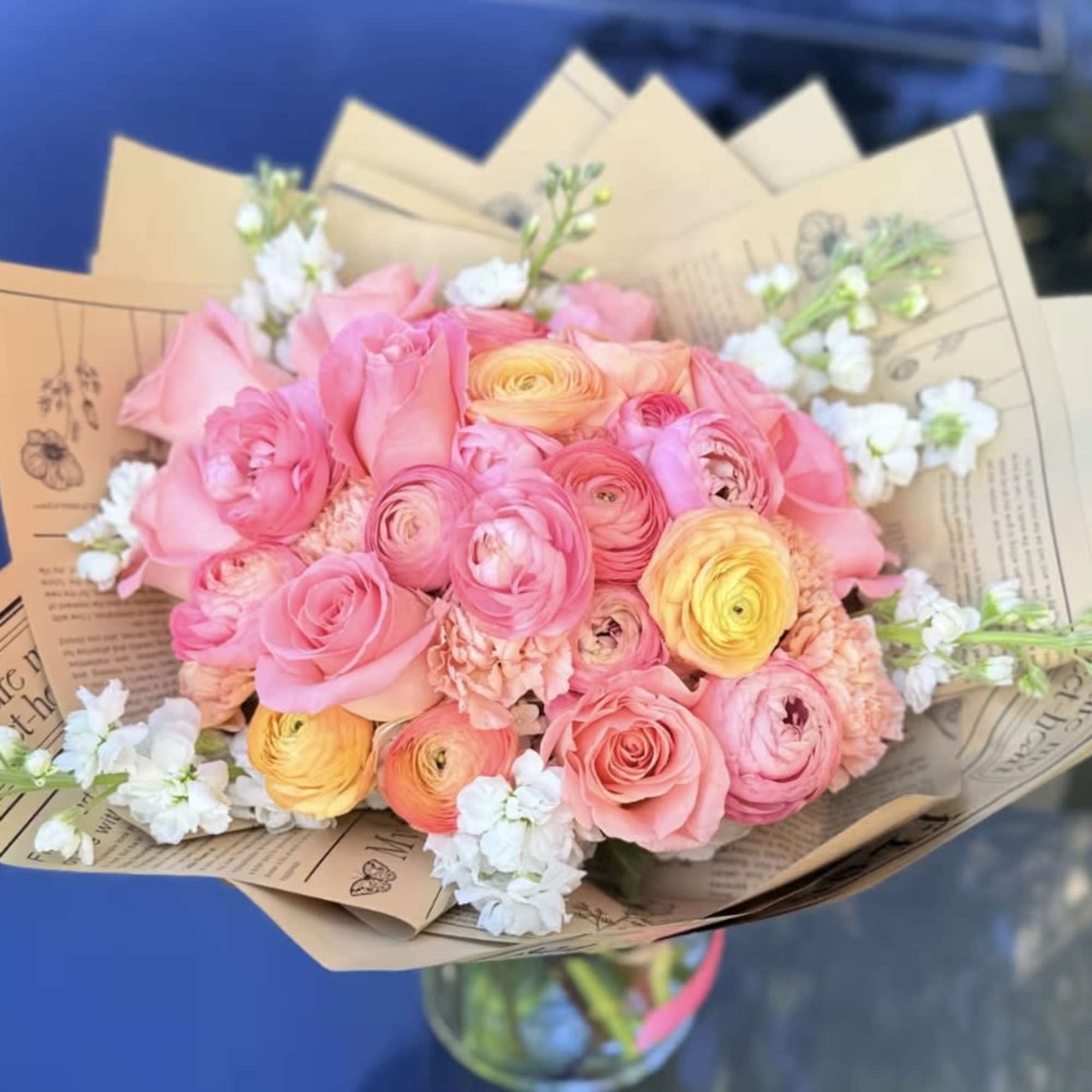 Gorgeous bouquet designed with 18 precious premium ranunculus in light pink and