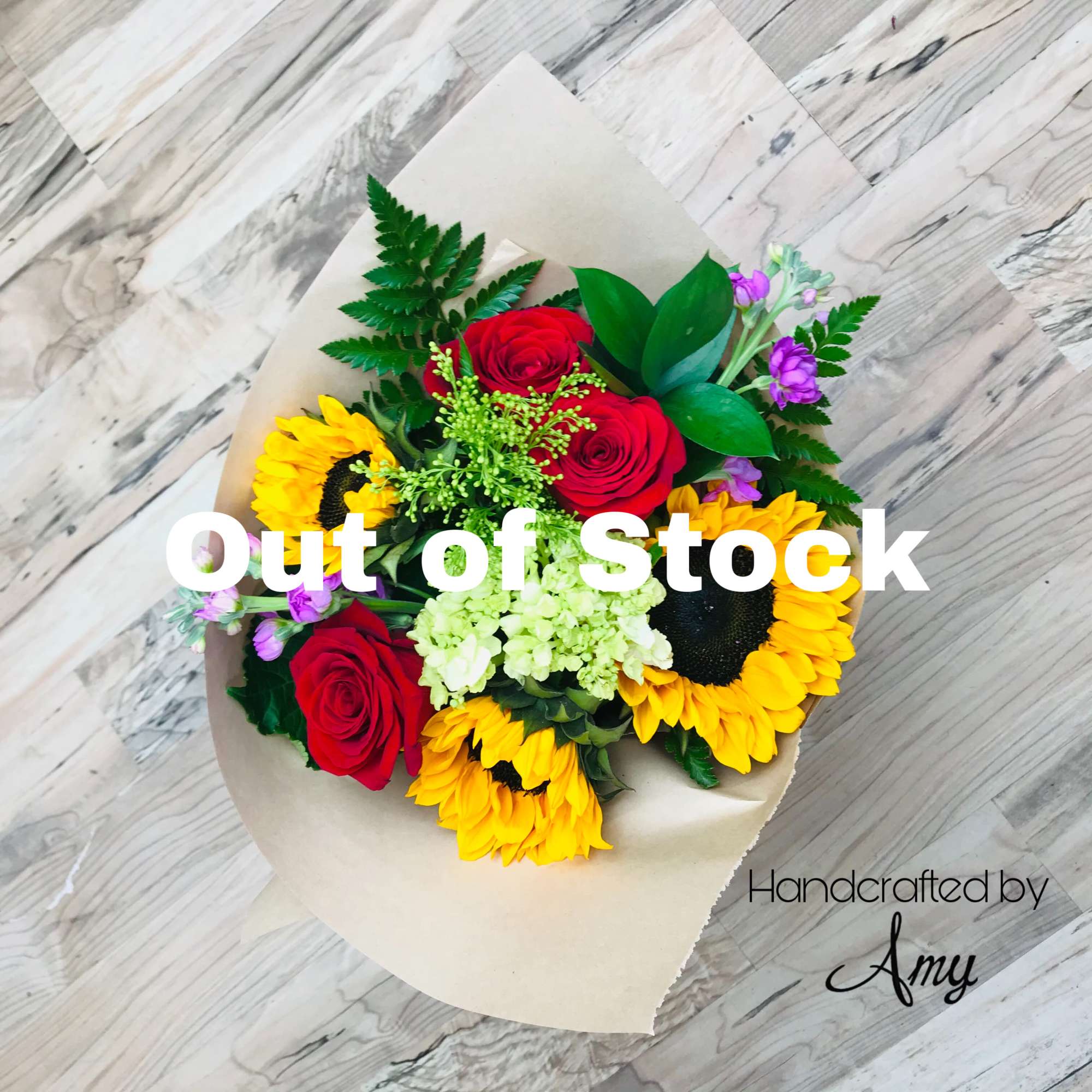 New to our hand wrapped bouquet line! Sunflowers and Red Roses are