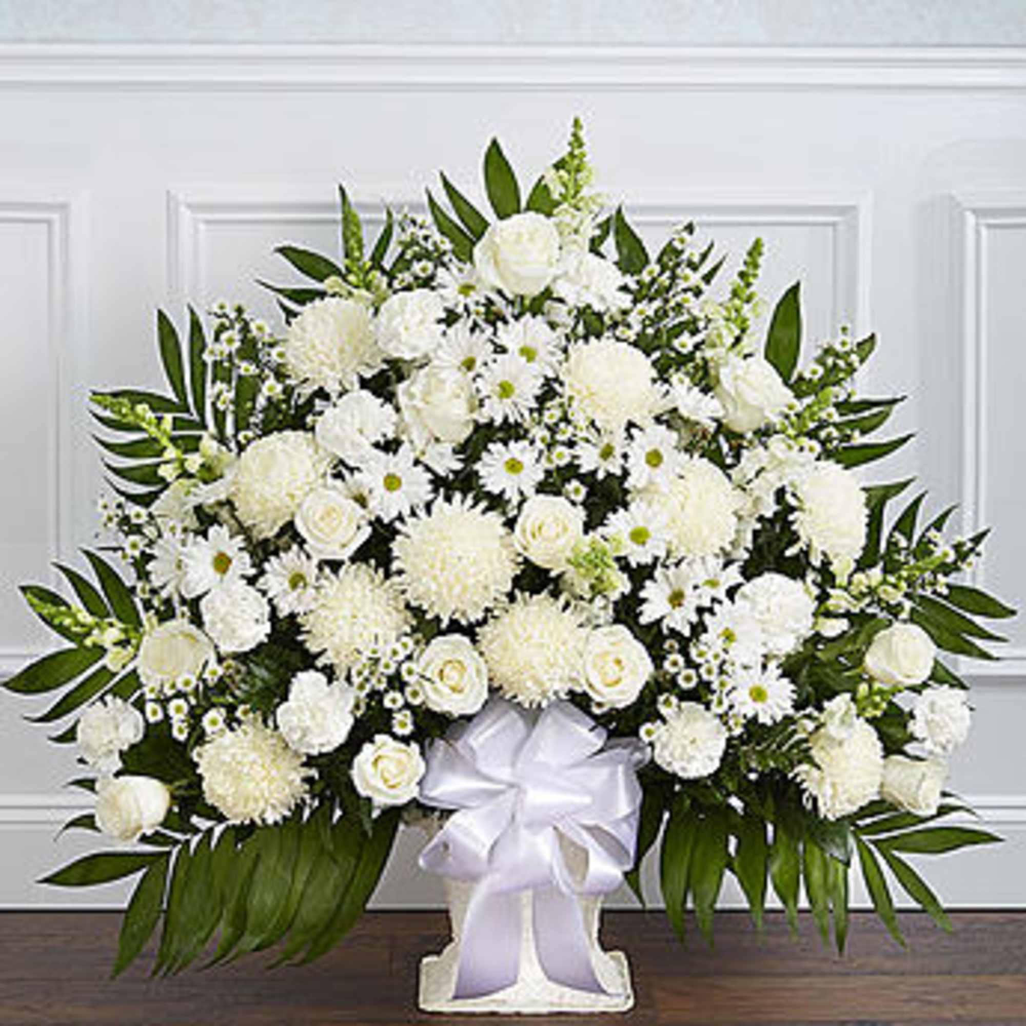 Product ID: 91212


Crafted from striking white blooms, our tasteful floor basket arrangement