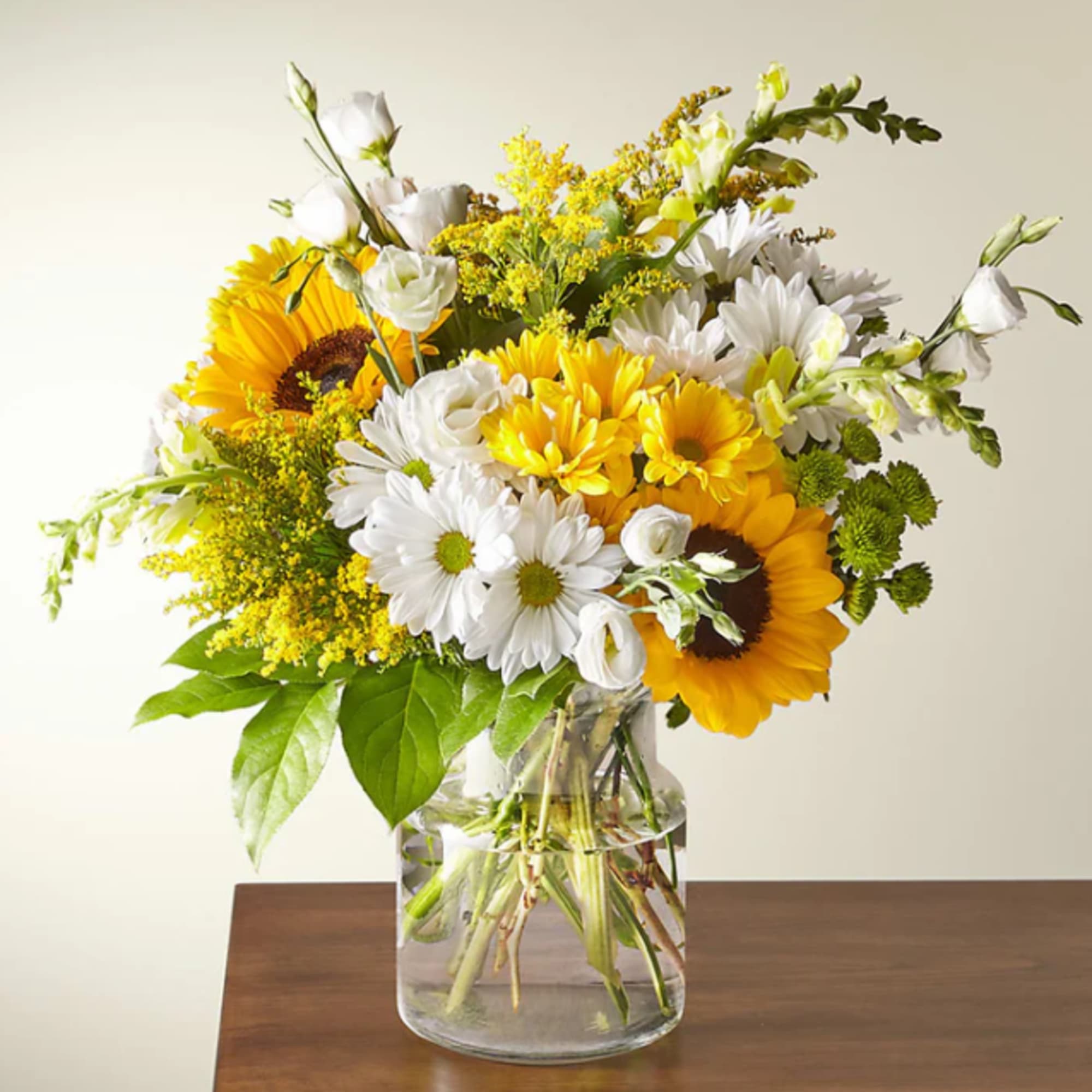 Give a dose of sunshine in bloom. This stunning bouquet is teeming