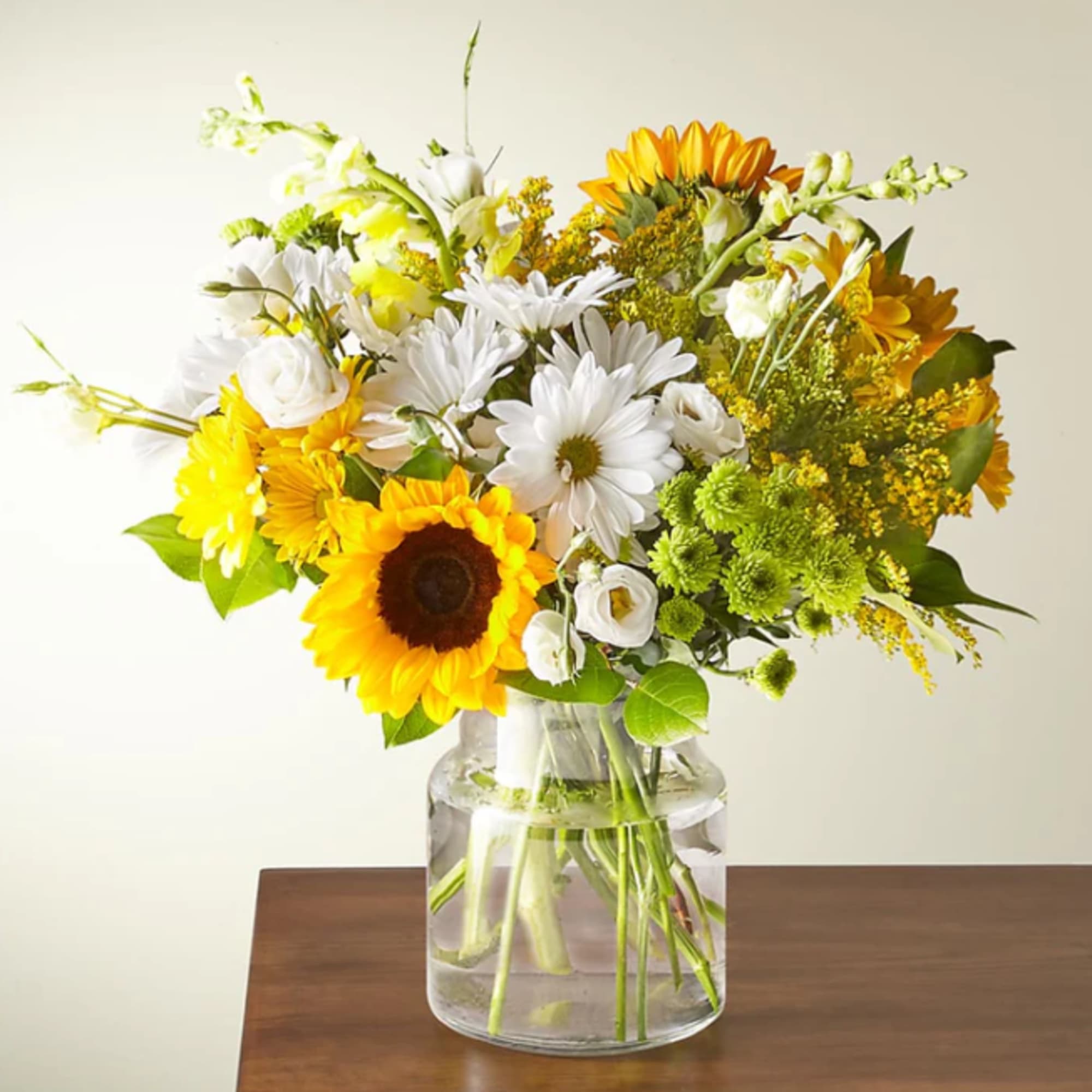 Give a dose of sunshine in bloom. This stunning bouquet is teeming