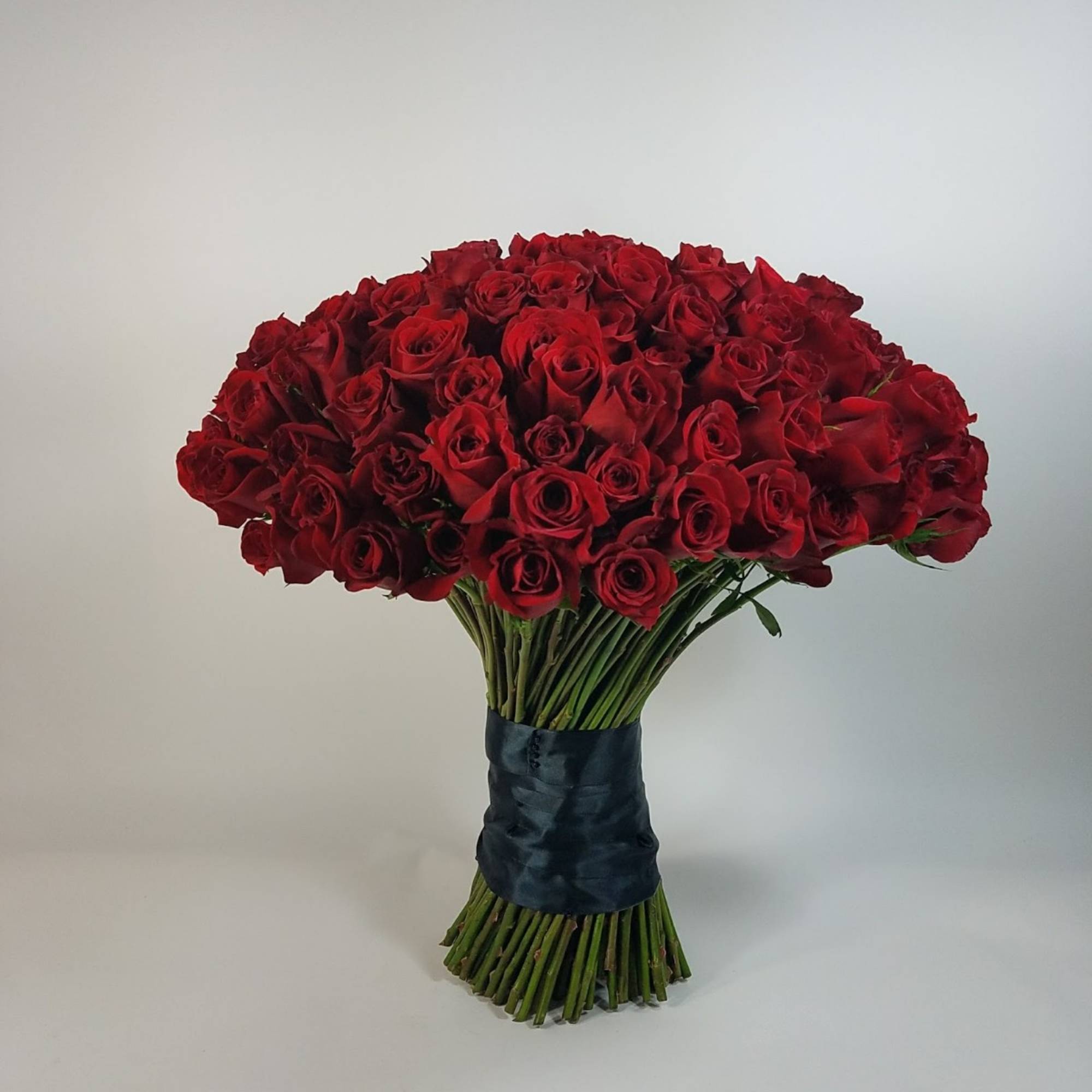Hand tie bouquet made of 100 Premium roses.