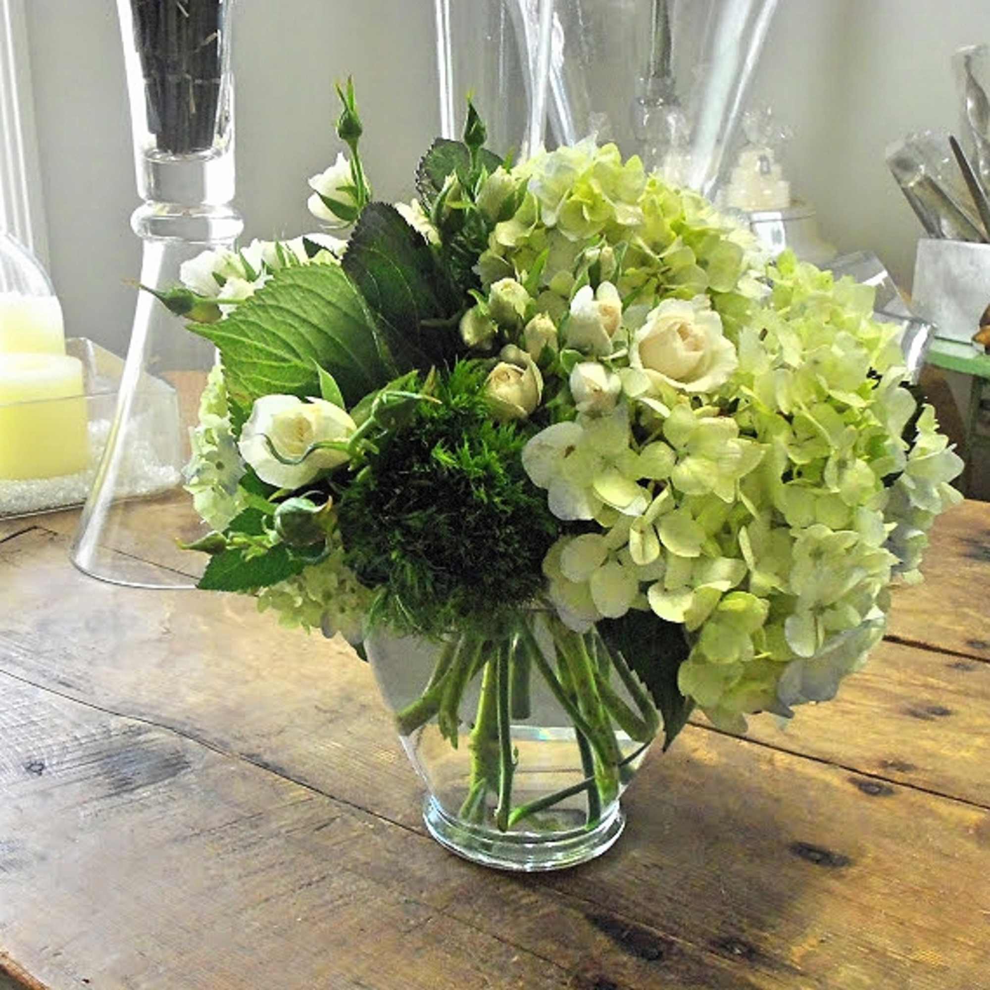 Elegance in Green and White
Introducing "Cool as a Cucumber," an arrangement that