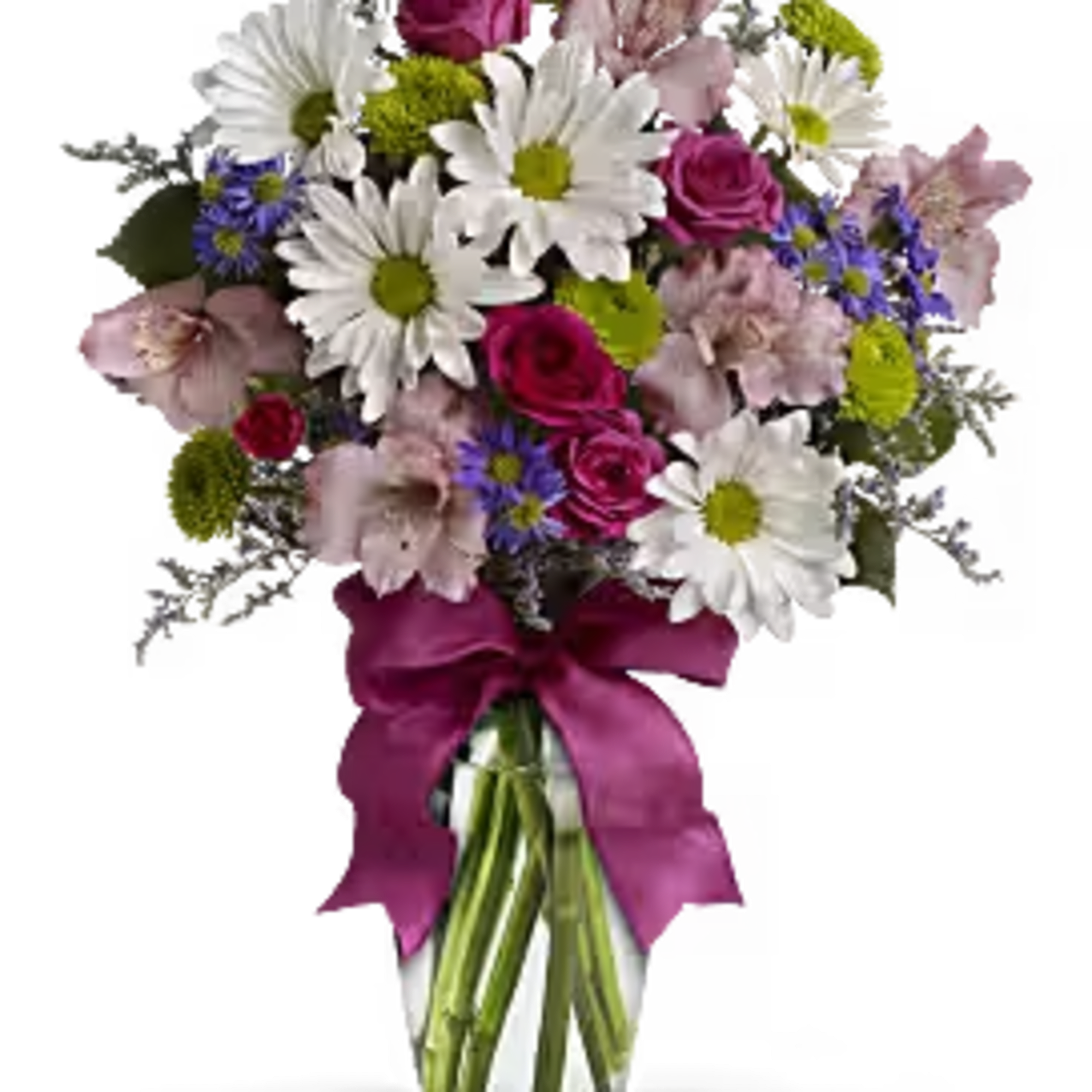MIX OF SPRINGY FLOWERS IN A CLEAR VASE ENOUGH TO MAKE ANYONE