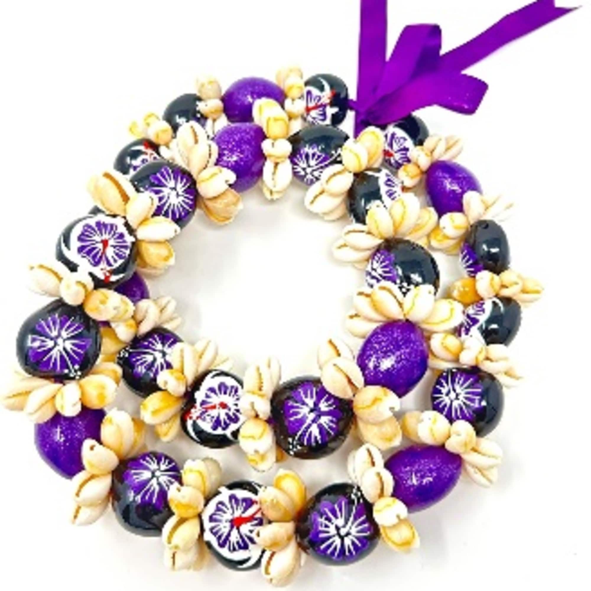 Hawaiian Kukui Nut lei with sea shells on it. **PLEASE SPECIFY COLOR