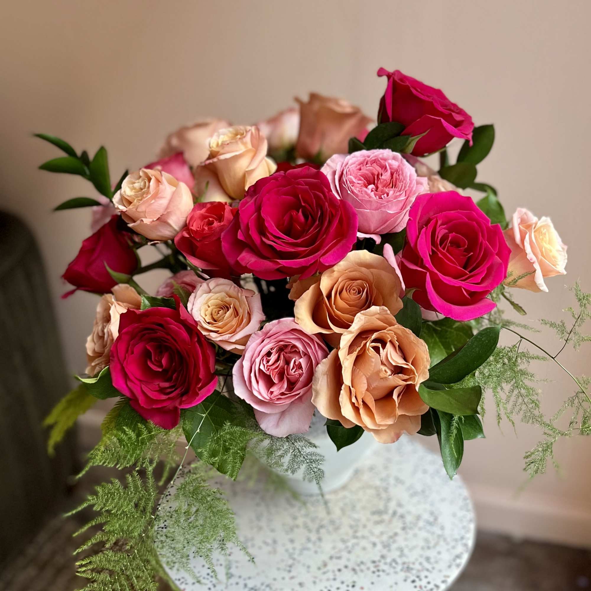 30 amazing roses in ombre shades of blush, peach and coral designed