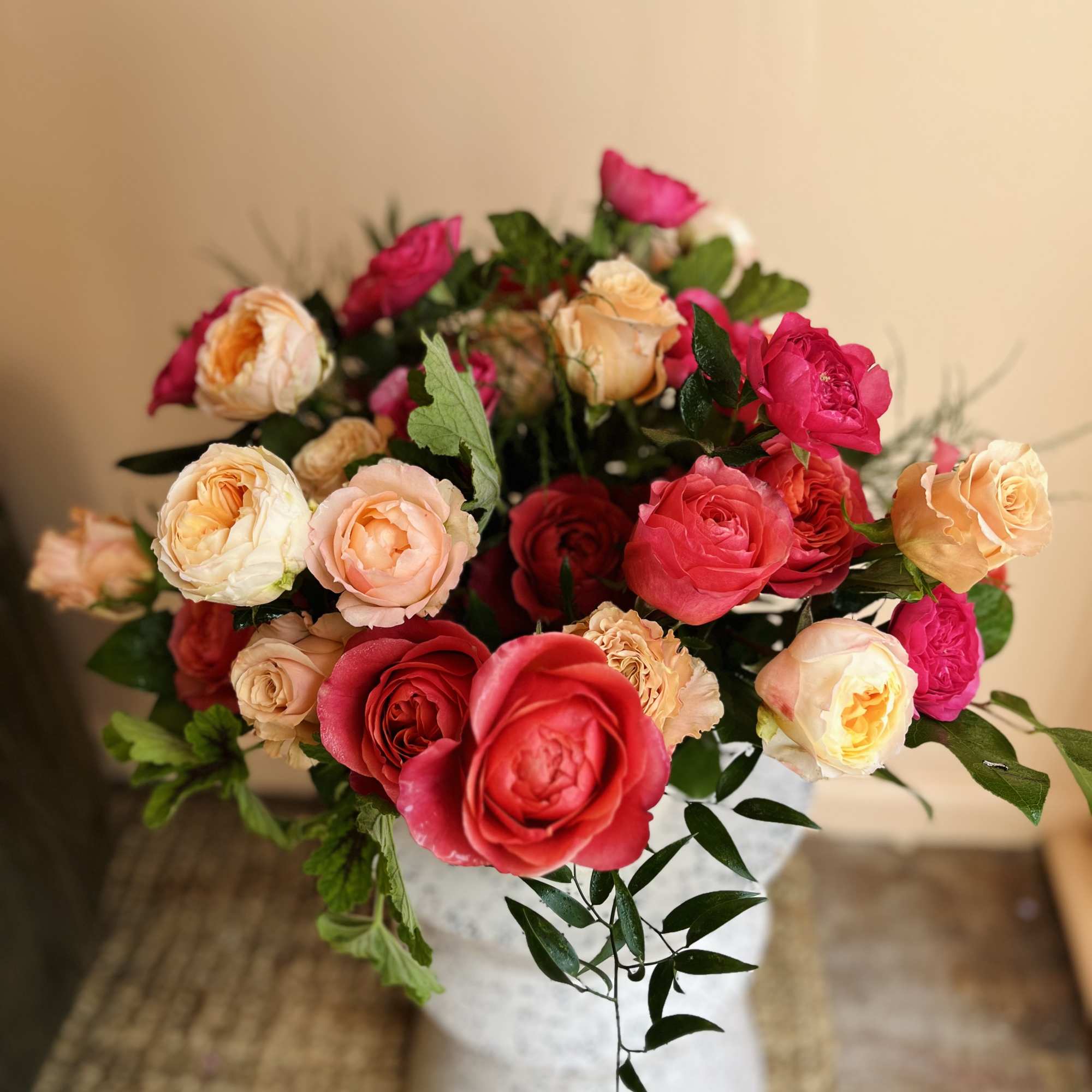 30 amazing roses in ombre shades of blush, peach and coral designed