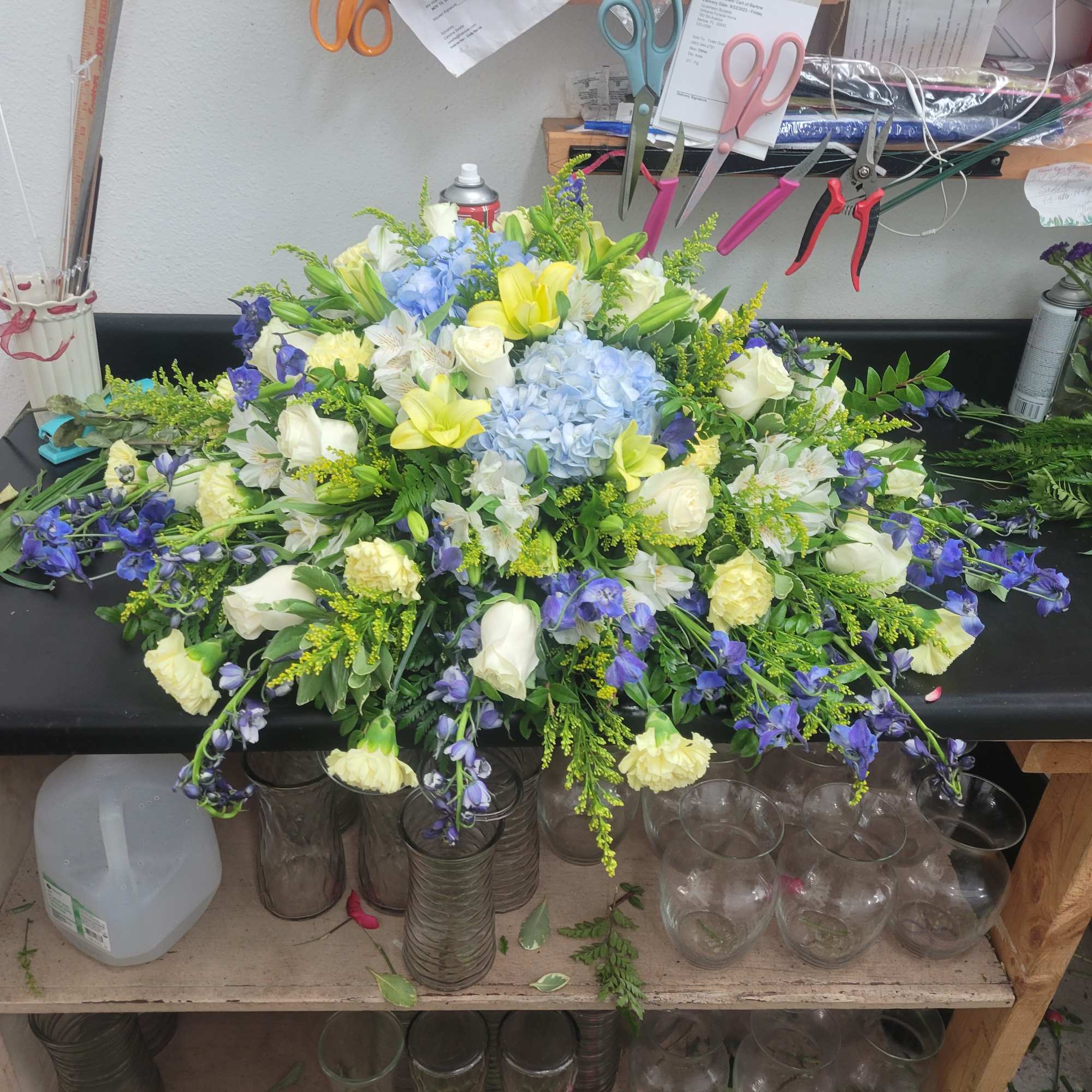 We make all casket sprays standard to cover half the casket if