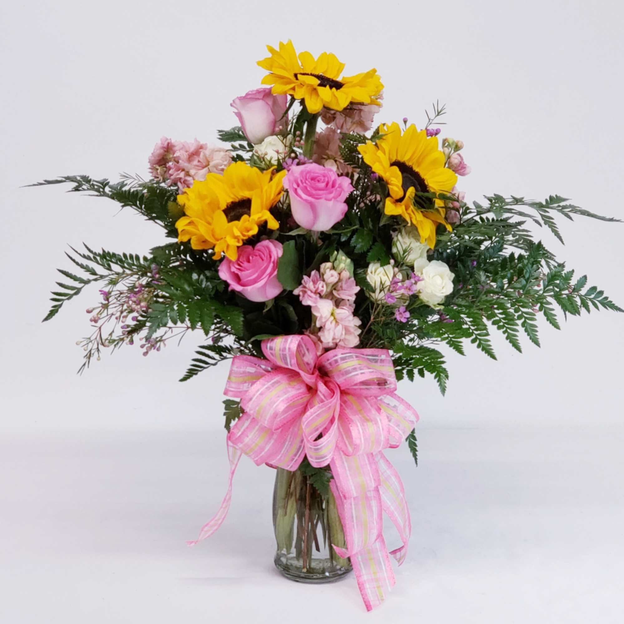 Cheerful, loving bouquet to express care and endearment with a sunny outlook!