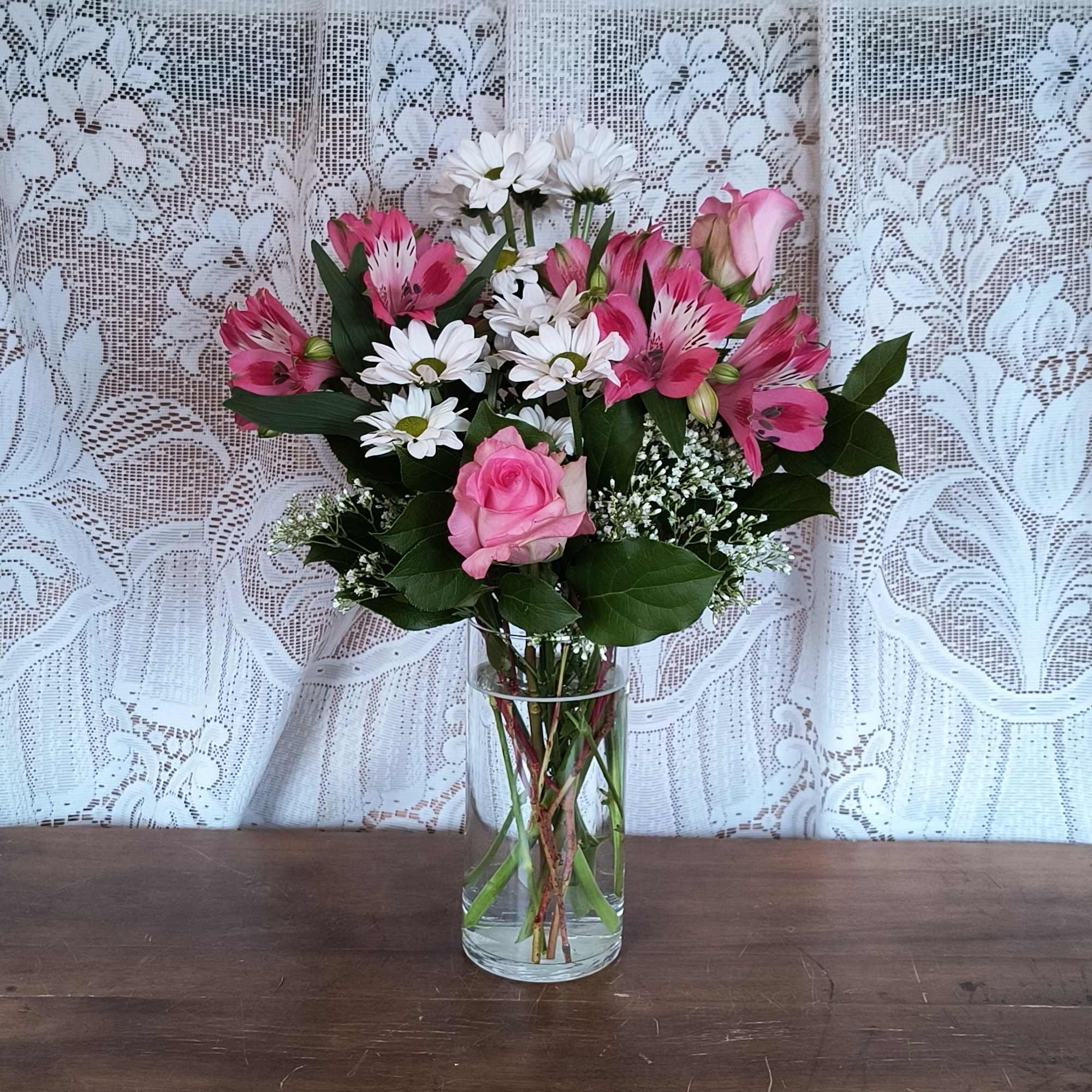 Soft and delicate, this pale pink and white bouquet speaks to the