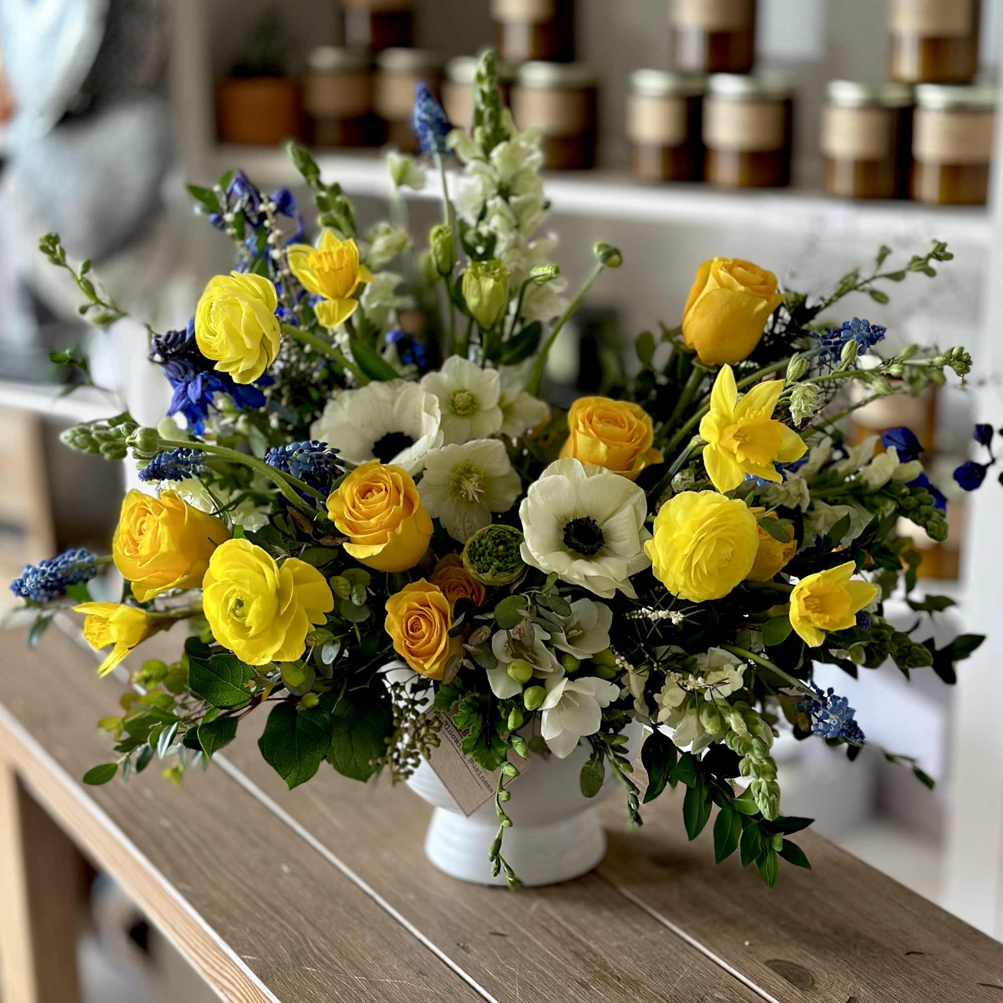 Lemon &amp; Ivory Luxe is a bright, elegant flower arrangement featuring golden