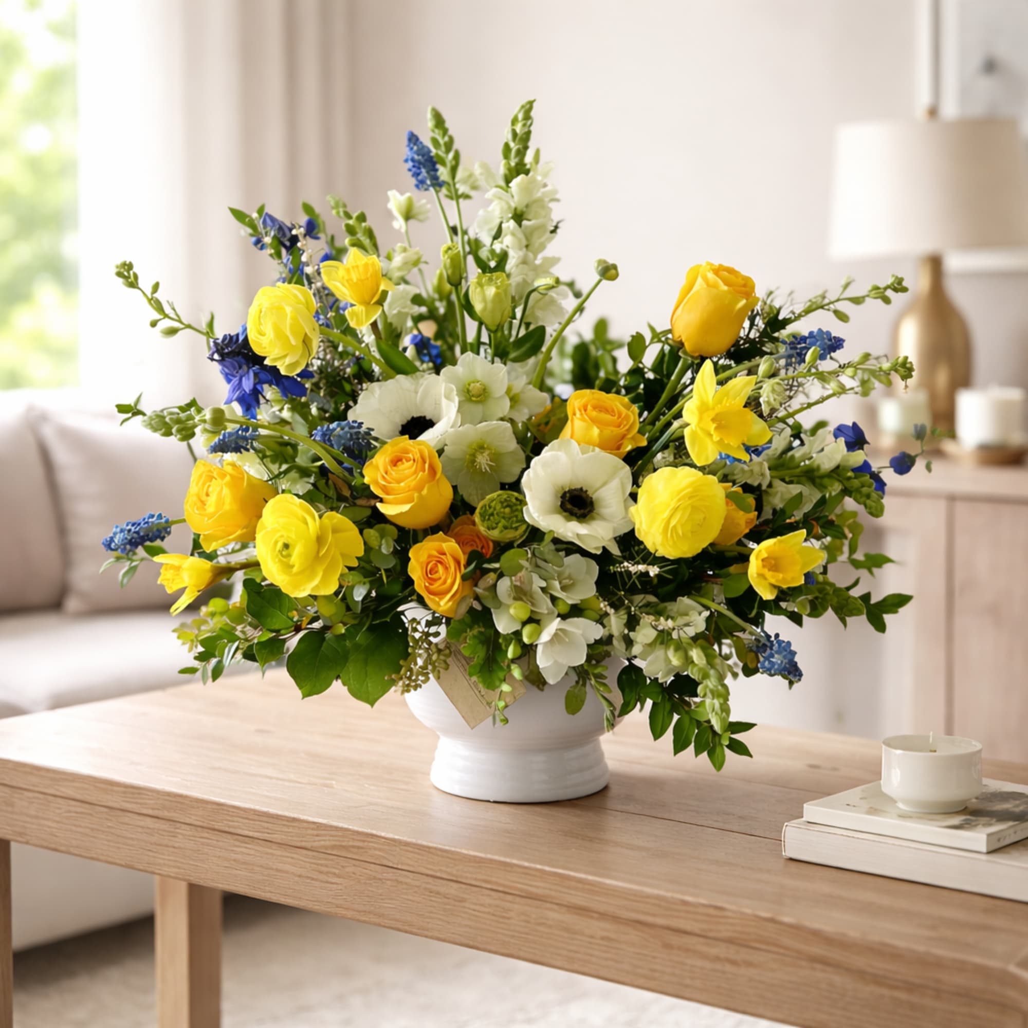 Lemon &amp; Ivory Luxe is a bright, elegant flower arrangement featuring golden