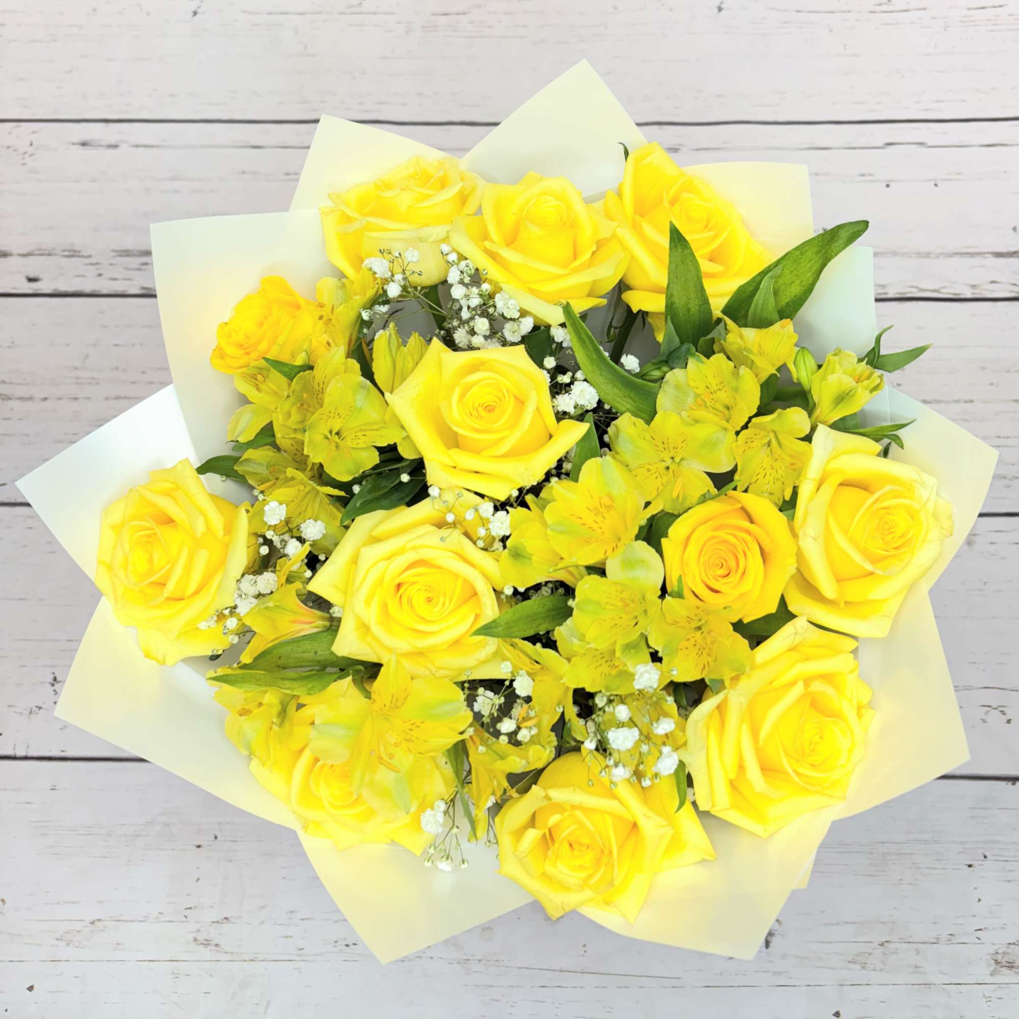 Yellow roses &amp; Alstroemeria-Wrap White paper and clear base.