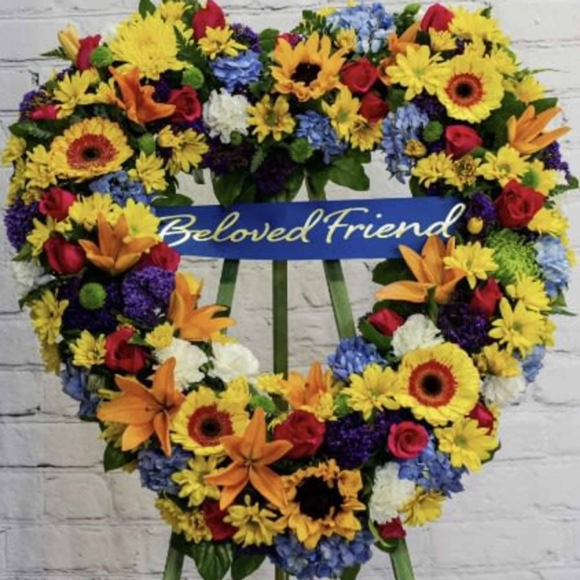 Our Heart Wreath Arrangement comes in two sizes 22" and 24". The