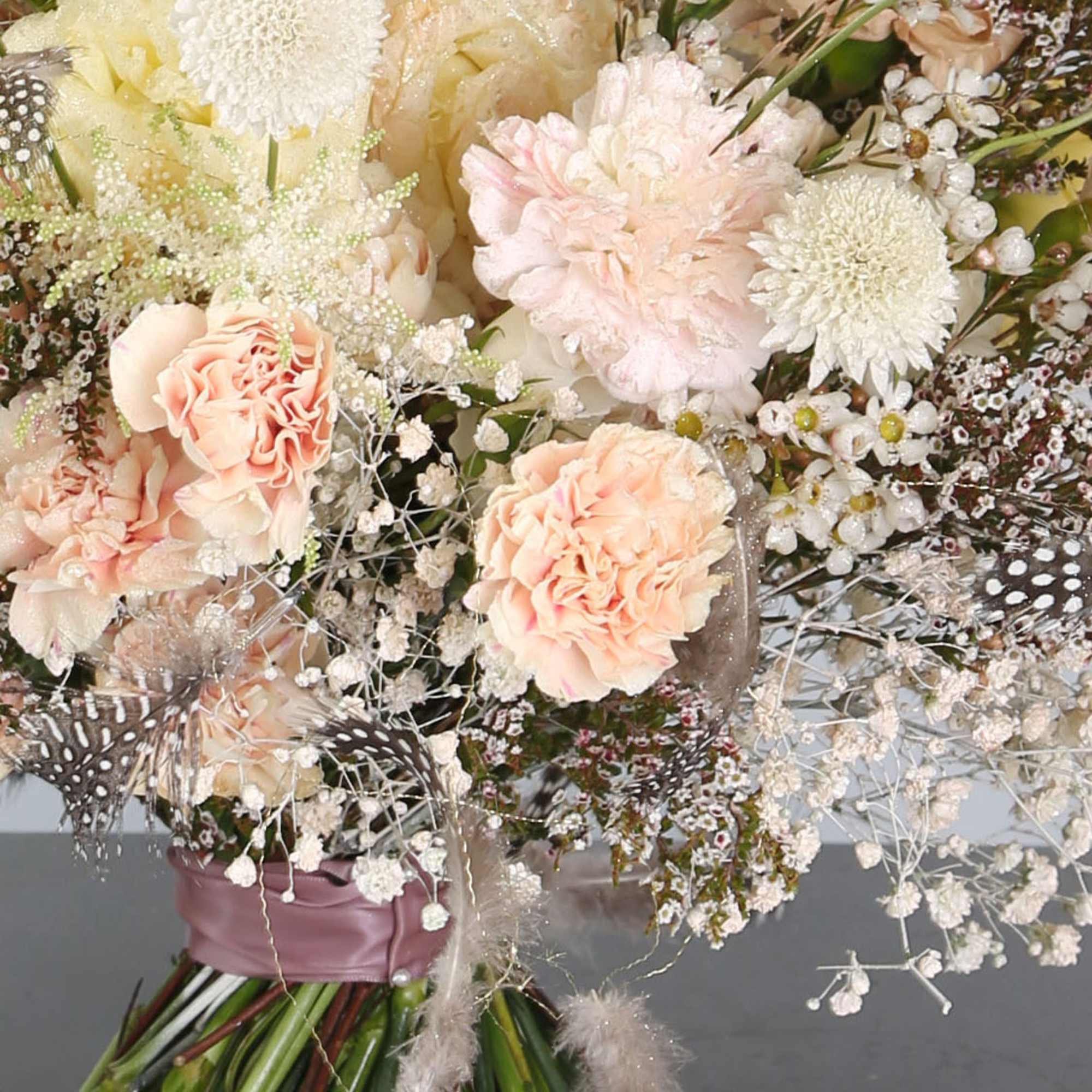 Designer custom made with seasonal bloom in soft pastel colorway in 8"